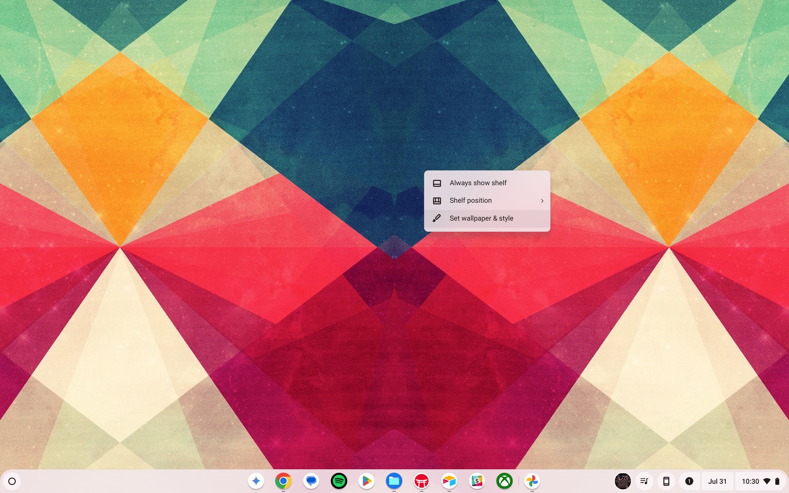 The wallpaper on a Chromebook Plus with the right-click menu open and the Set wallpaper & style option highlighted