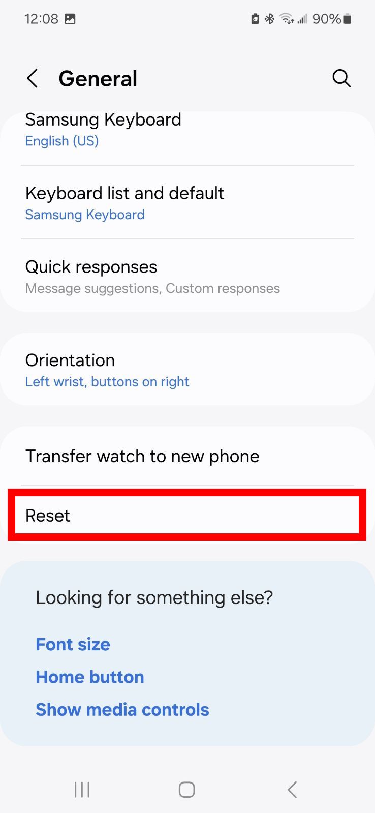 Red rectangle outline highlighting Reset option in the Galaxy Wearable app
