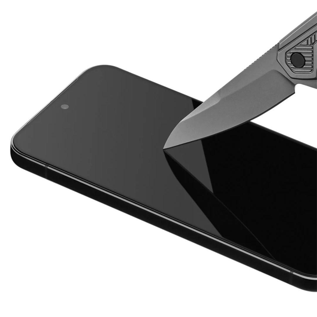 A screen protector on top of a device with a knife attempting to scratch its surface