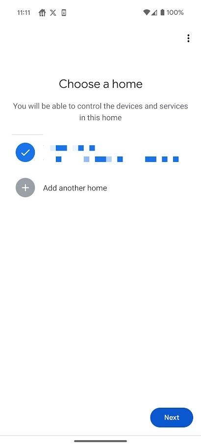 pixelated address in blue text on white background in google home app