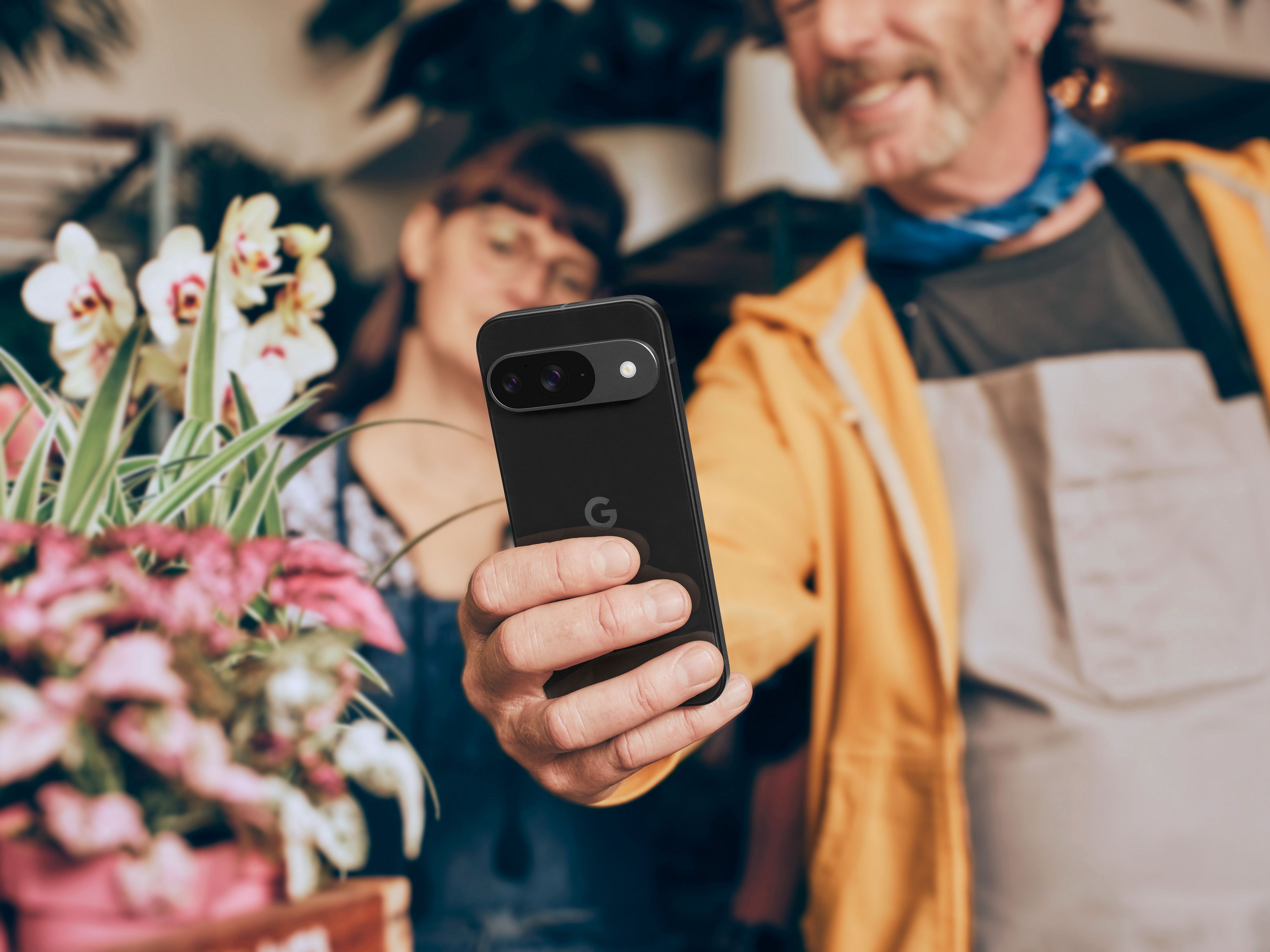 Person using the Google Pixel 9 to take a photo.