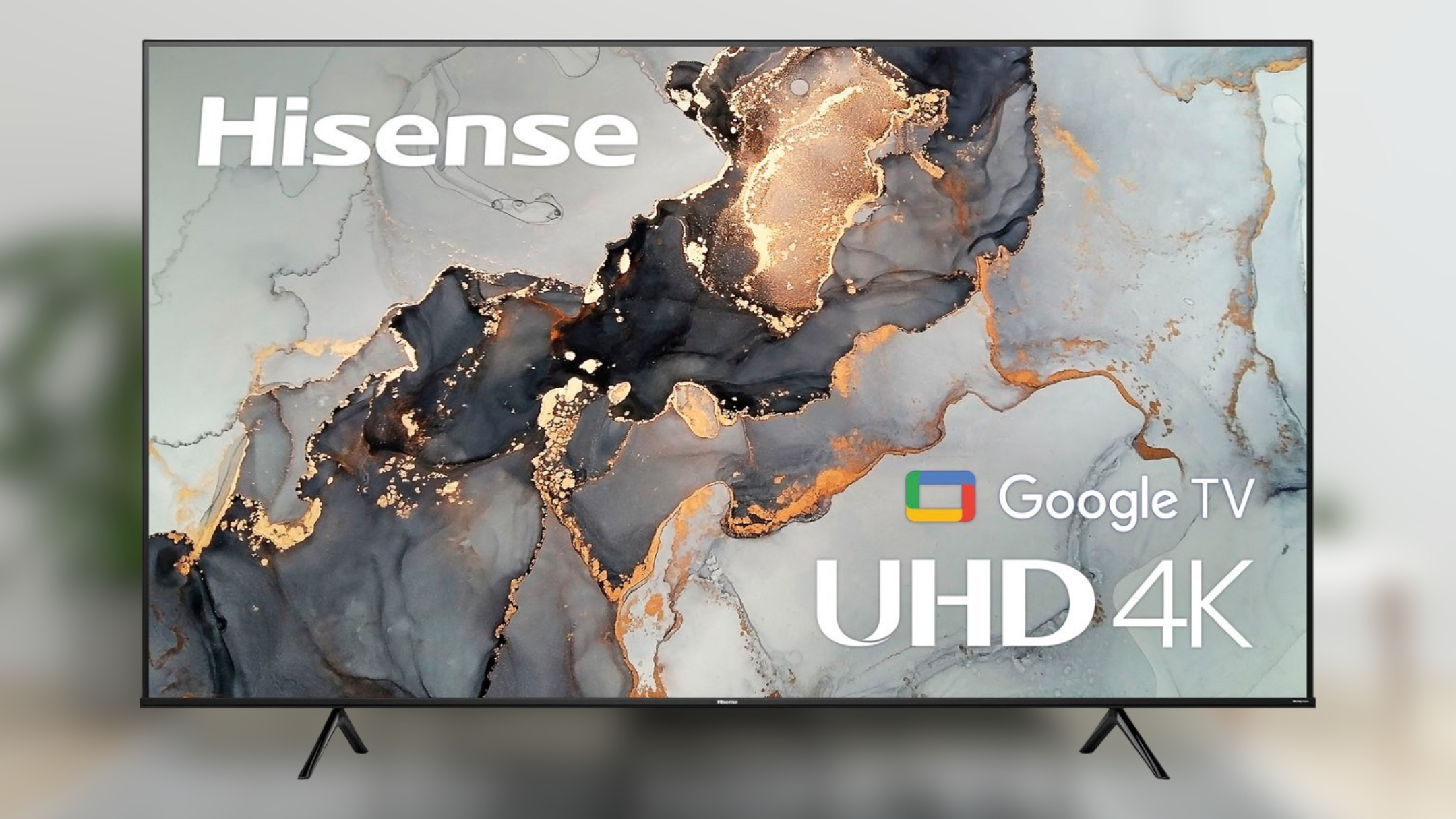 Hisense 55-inch Class A6 Series LED 4K UHD HDR Smart Google TV on blurred background