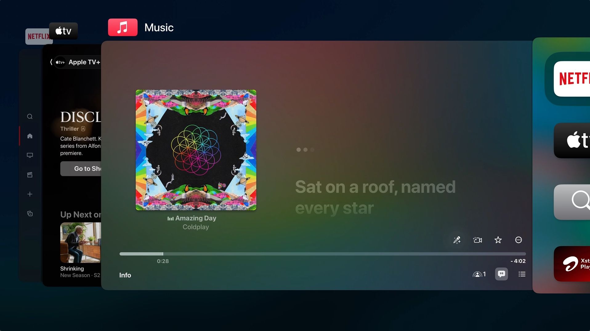 Multiple apps open on Apple TV, including the Apple TV app, Music, and Netflix