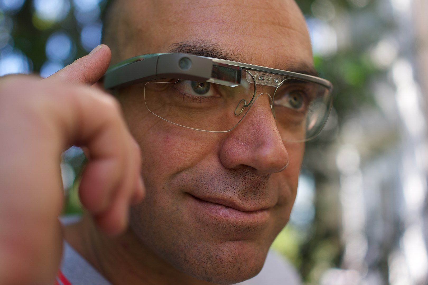 A man wearing the Google Glass smart glasses