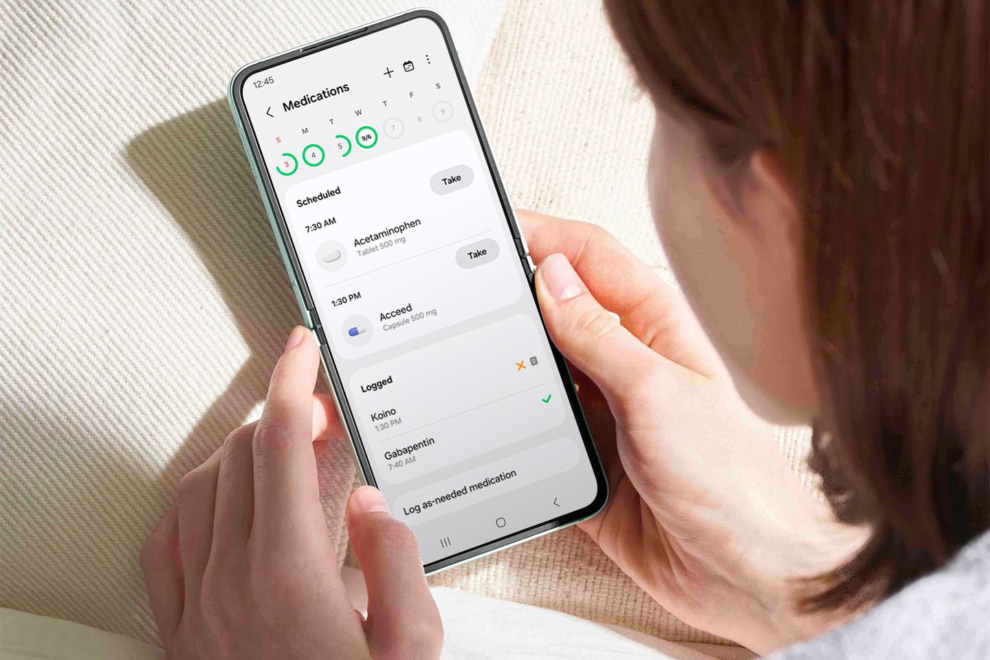 A person using Samsung Health to keep track of medications