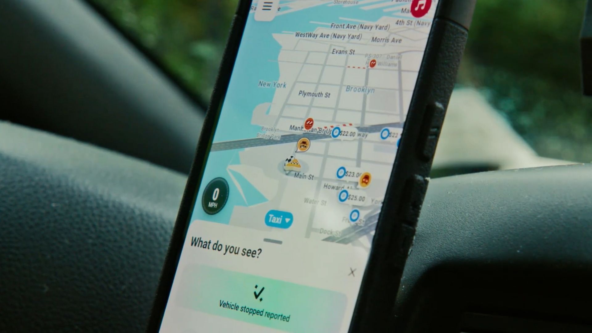 The Waze app demonstrating a Conversational Reporting feature