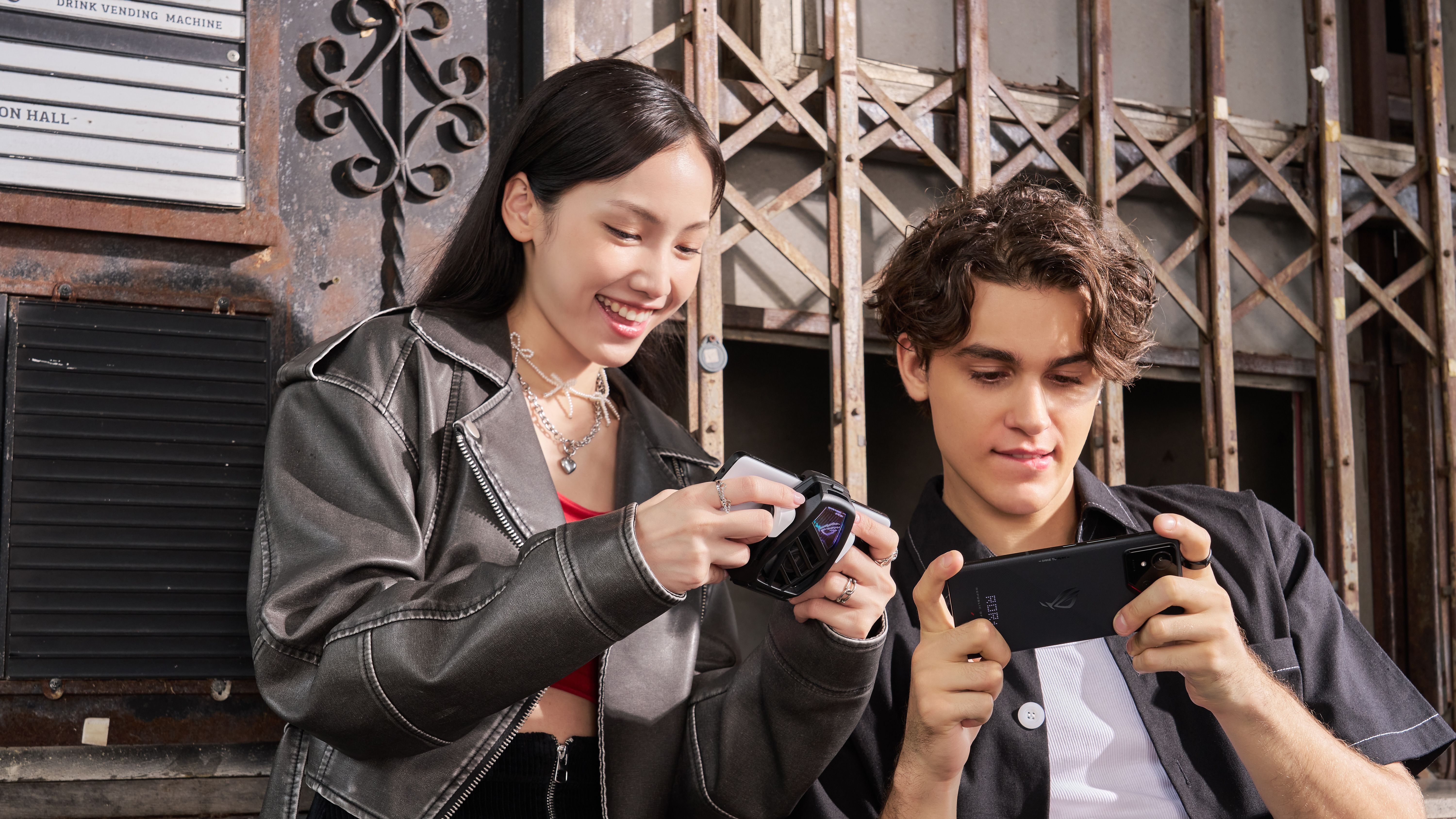 man and woman playing on ROG Phone 9