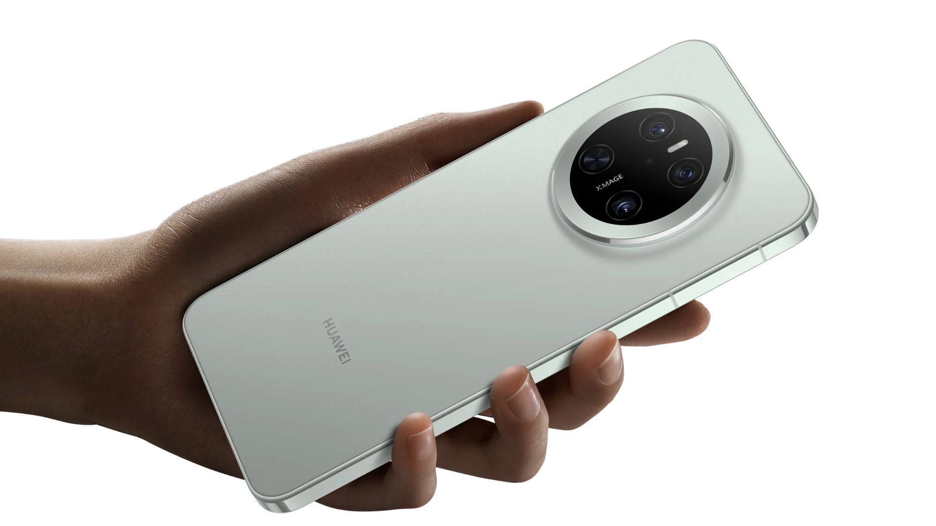 A hand holding the Huawei Mate 70 in front of a white background