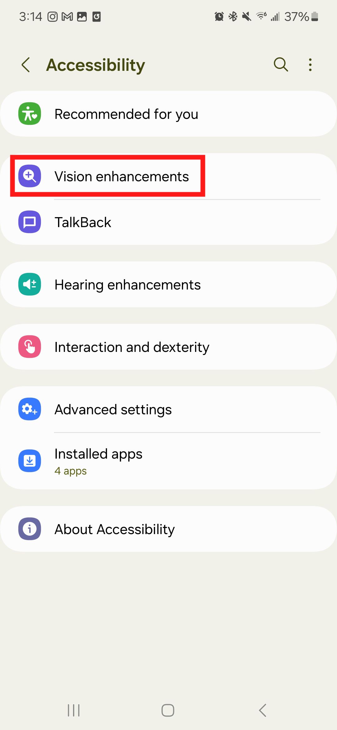 A screenshot of the Samsung Galaxy S22 settings menu with a red box around Accessibility.A screenshot of the Samsung Galaxy S22 Accessibility settings menu with a red box around Vision enhancements..