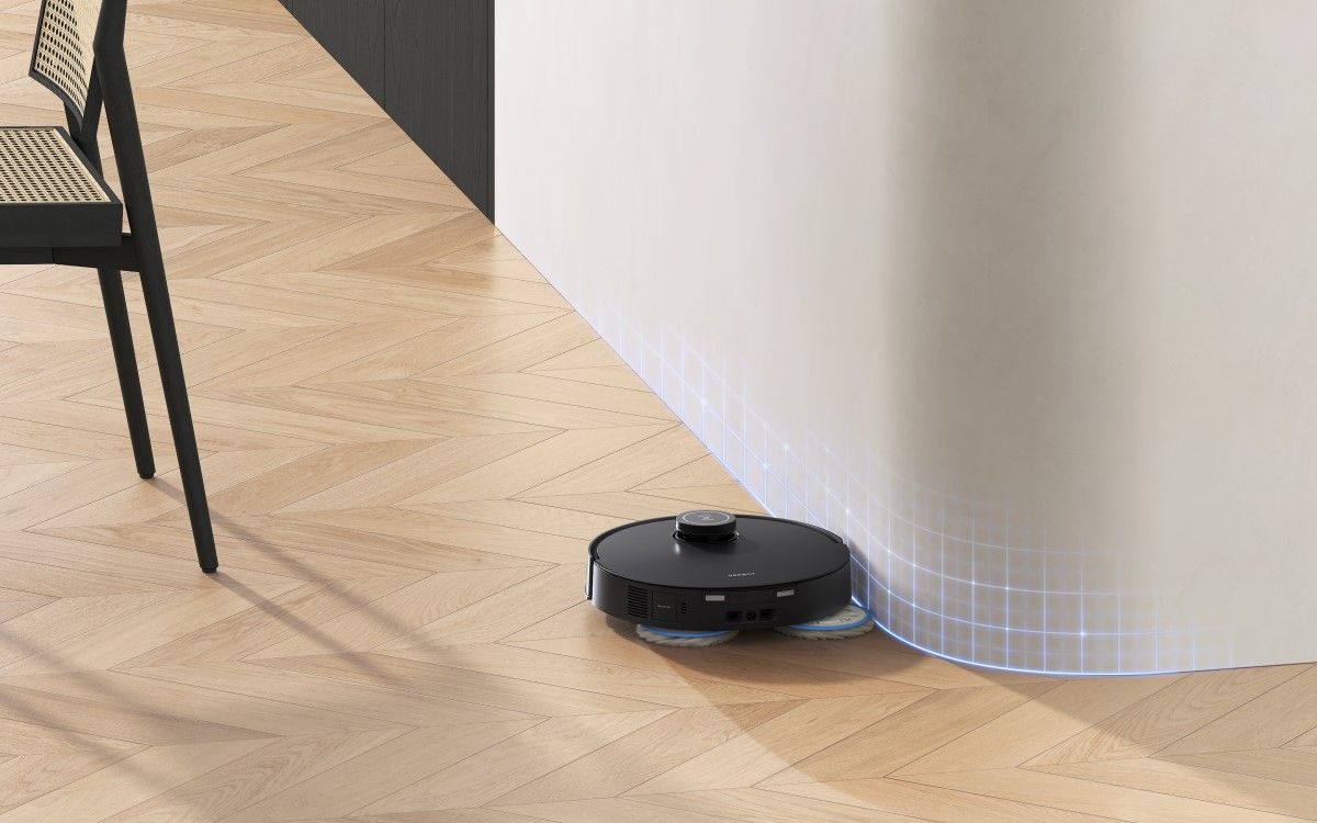 The ECOVACS DEEBOT T30S mopping around a wall