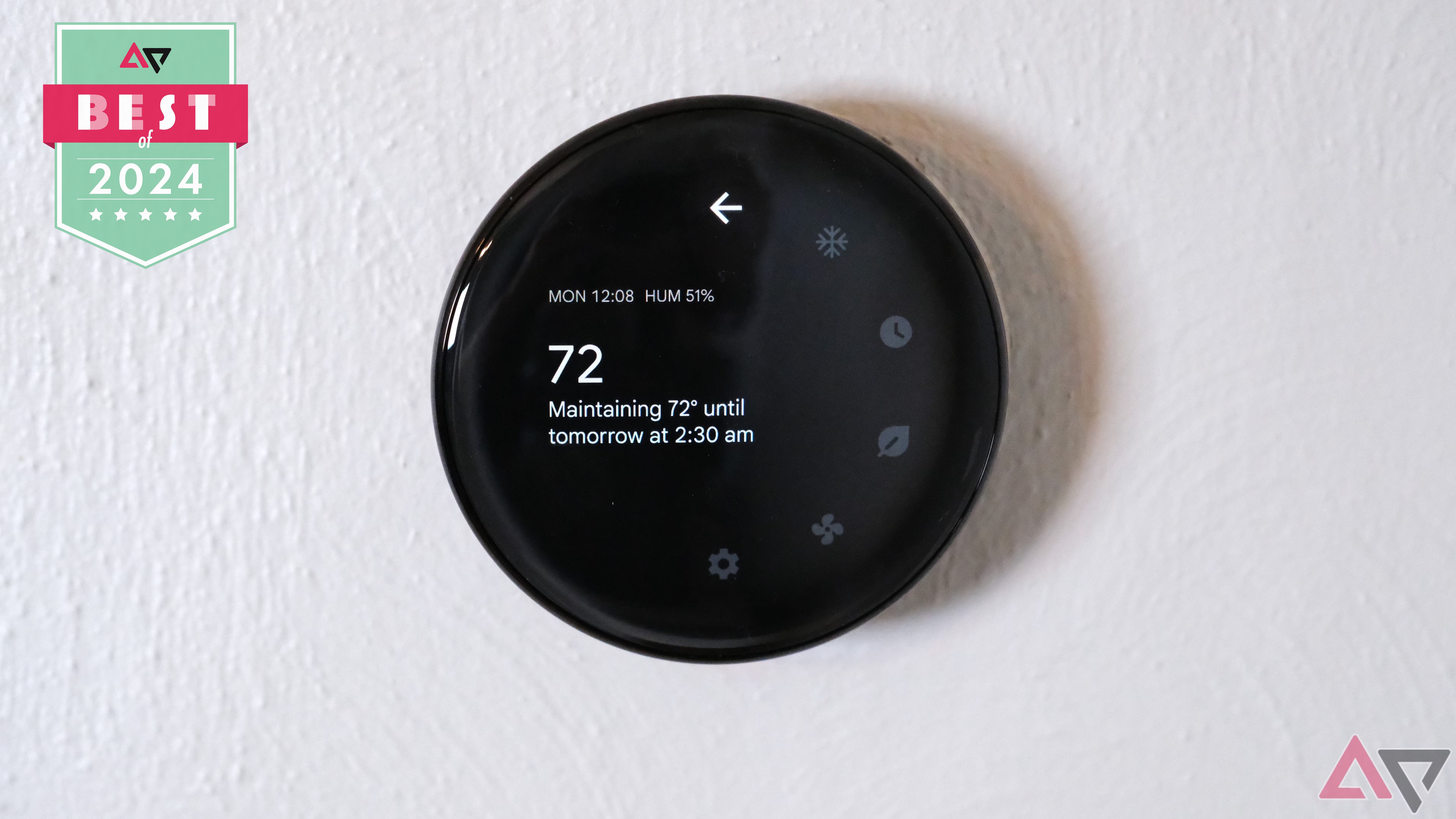 The Nest Learning Thermostat 4th Gen with Android Police's Best of 2024 award logo attached