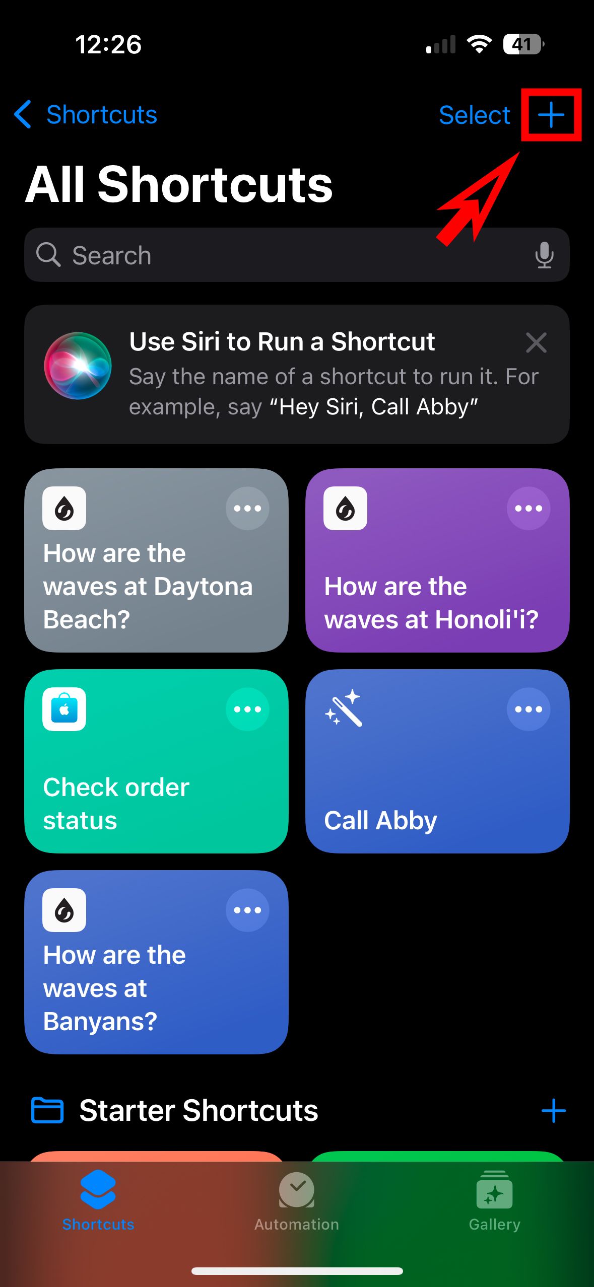 A screenshot of the Shortcuts app with a red arrow and box around the plus sign. 