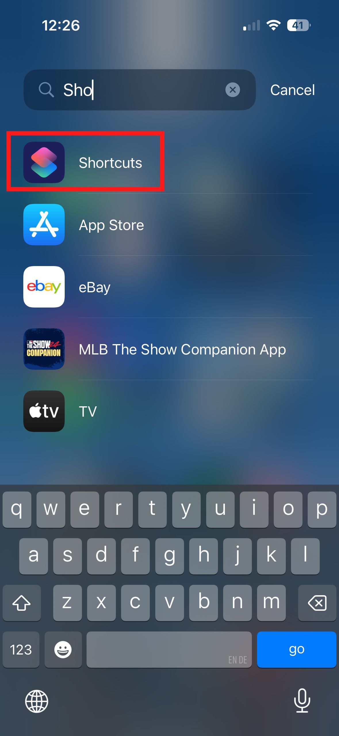 A screenshot of an iPhone's app search page with a red box around the Shortcuts app.