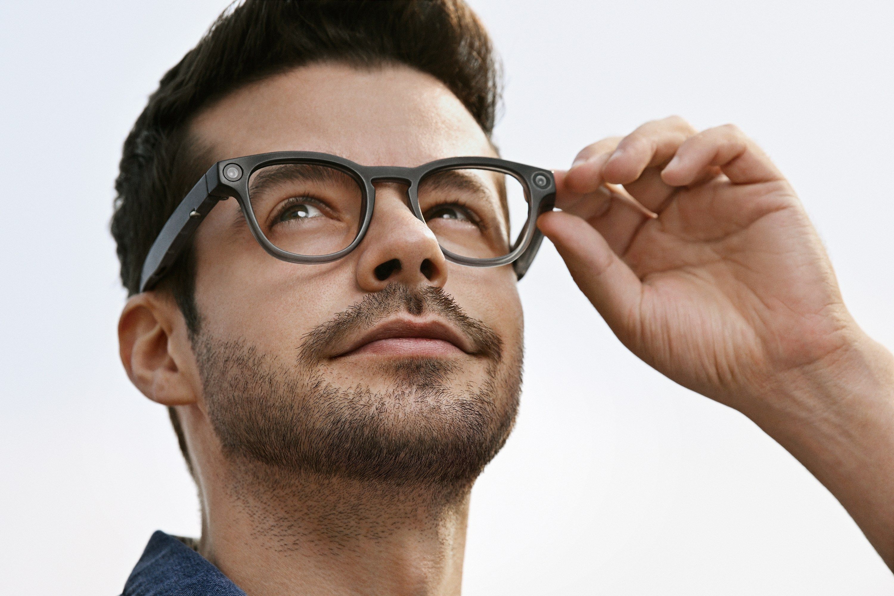 A man wearing a pair of smart glasses