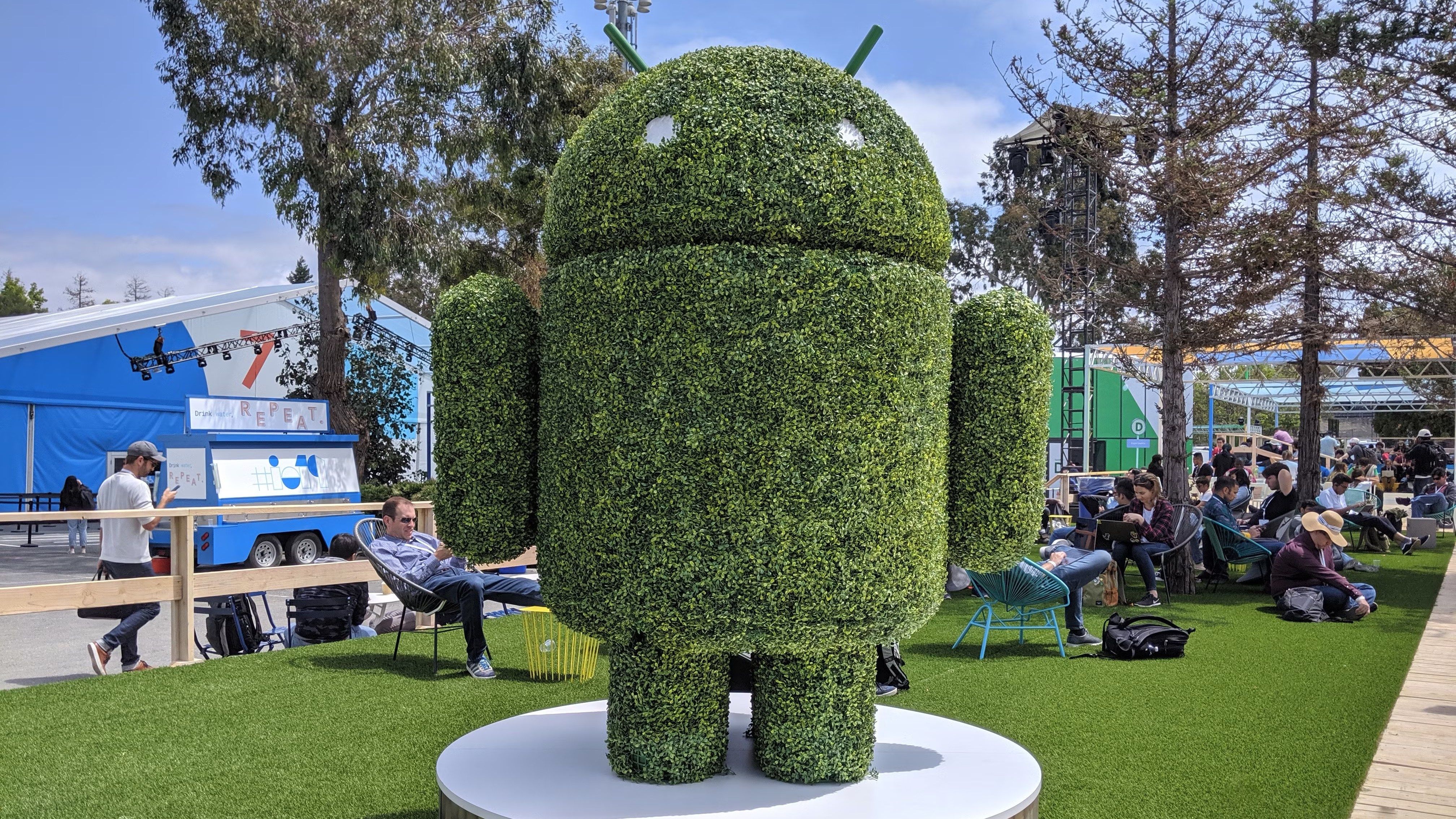 A huge bush trimmed into the shape of the Android robot, BugDroid or The Bot