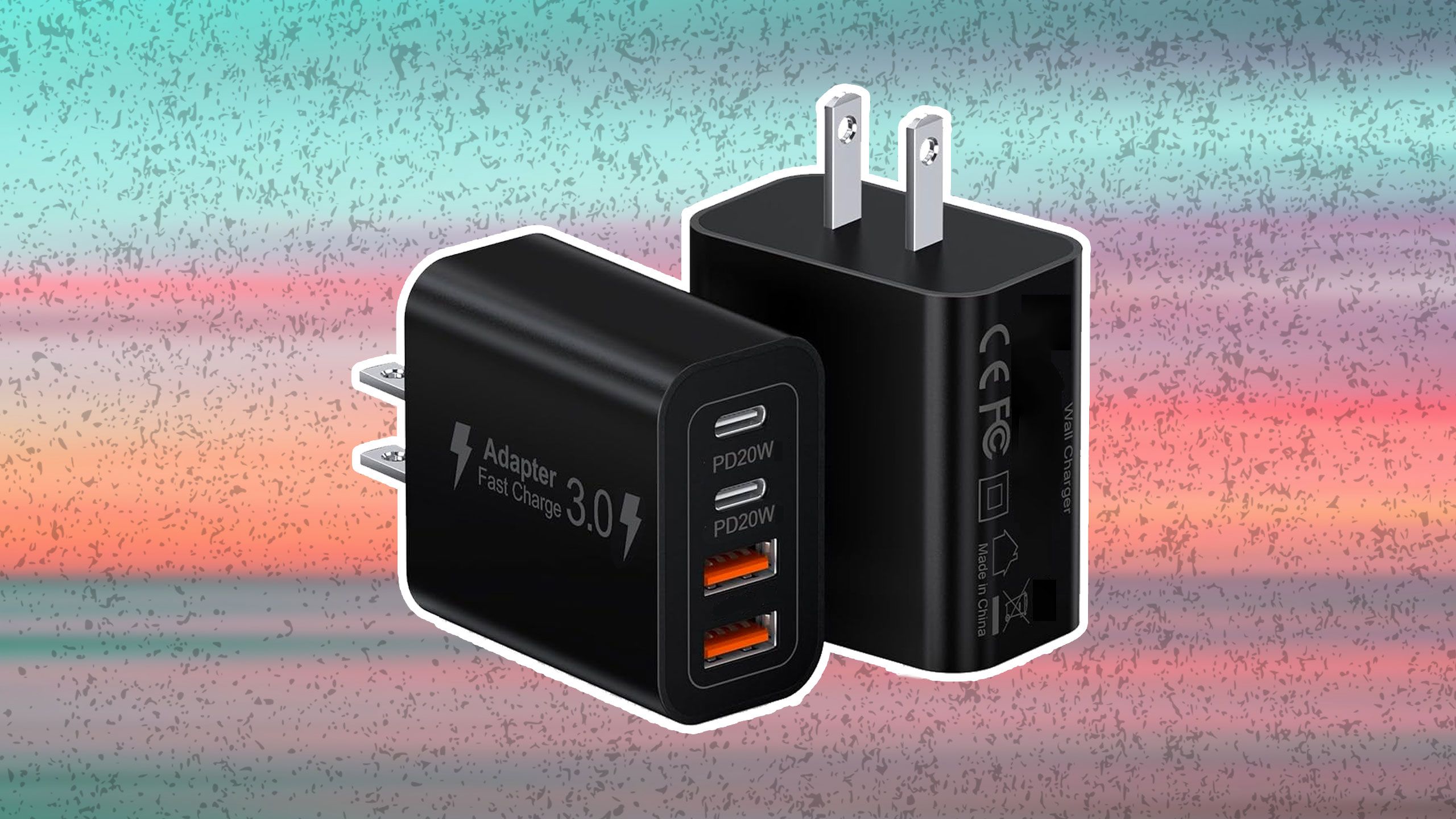 a pair of USB-A / USB-C charging blocks against a multicolored background