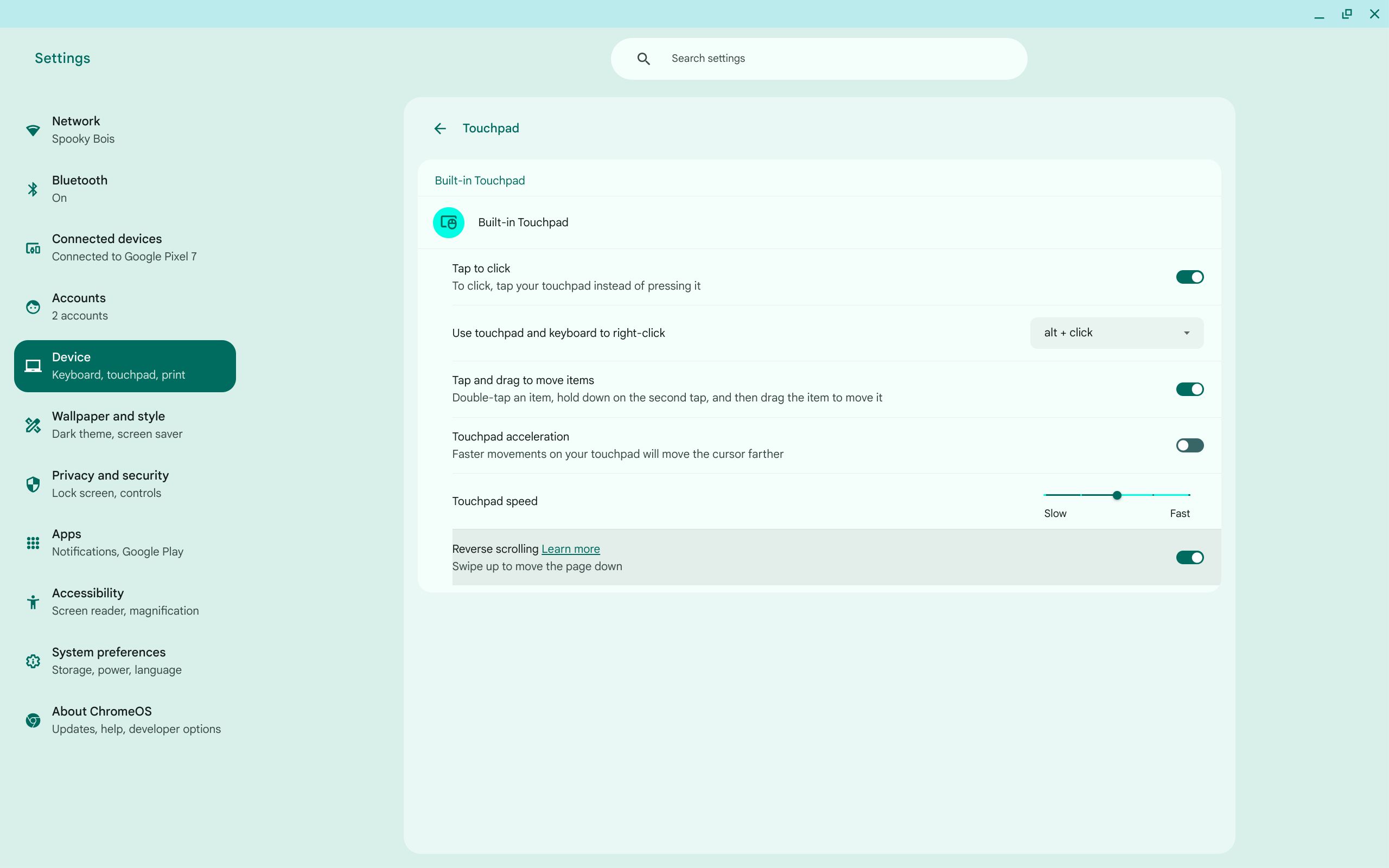 Touchpad settings on a Chromebook with the Reverse scrolling option highlighted
