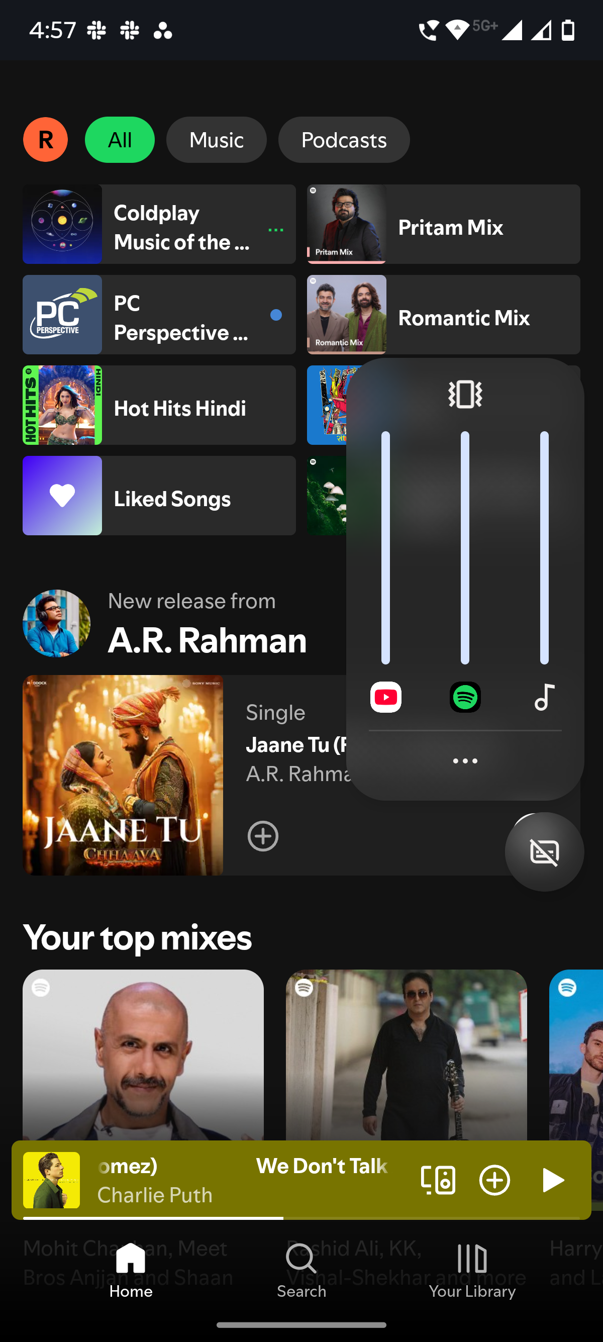 Screenshot showing Multi-volume feature with Spotify app opened