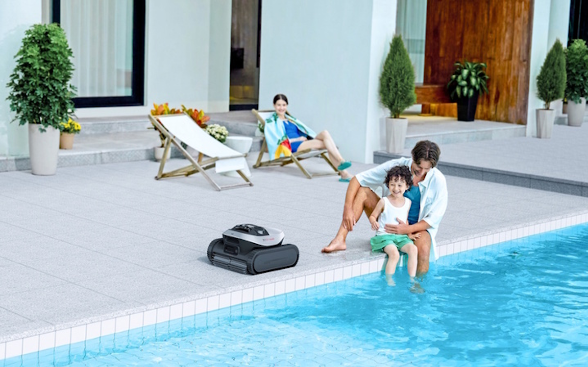 Dreame Z1 Pro pool cleaner poolside with family