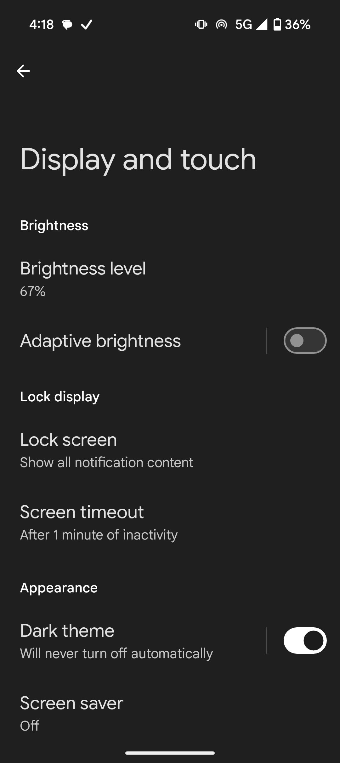 Display settings showing brightness, lock screen, and dark theme options