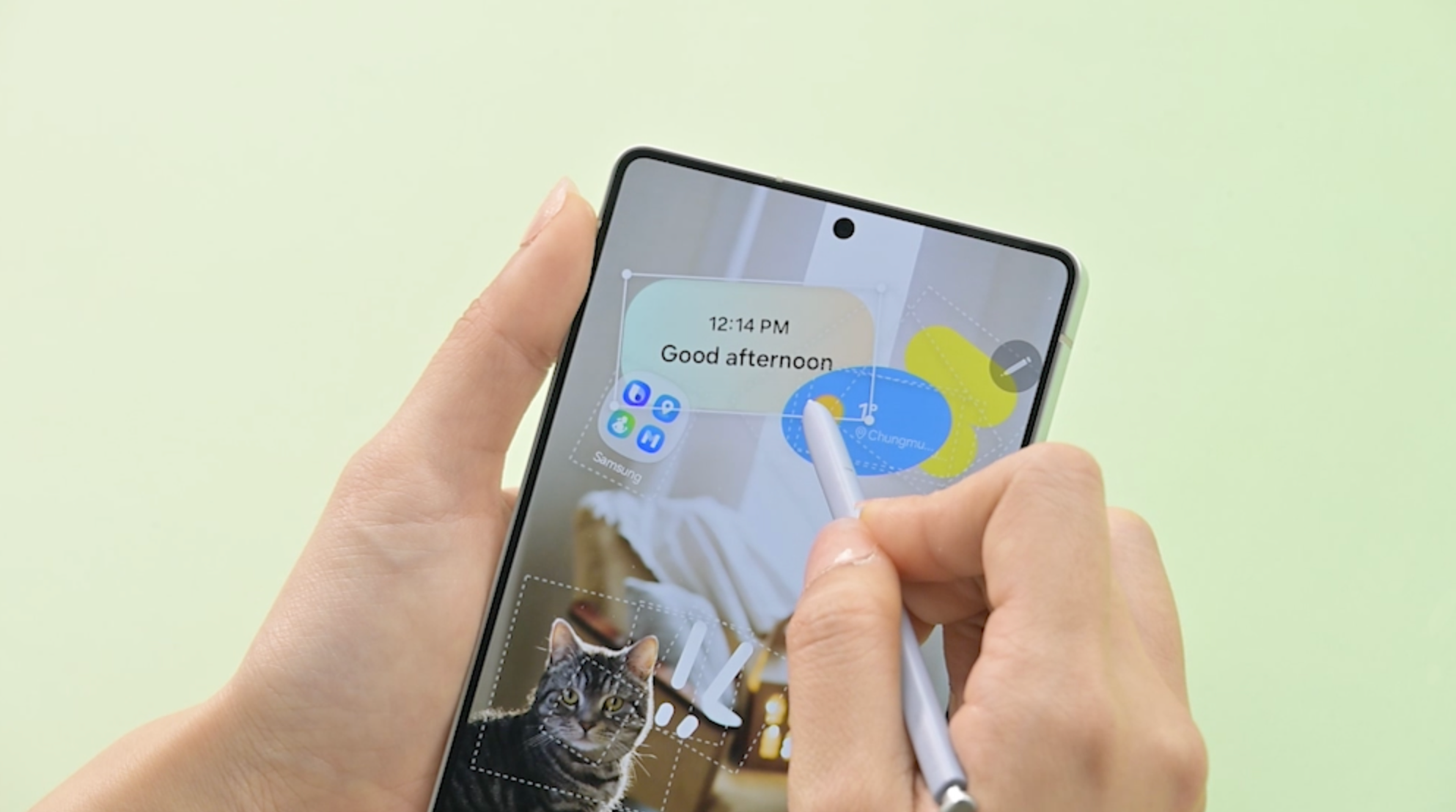 Person using phone to customize home screen with Samsung's Home Up