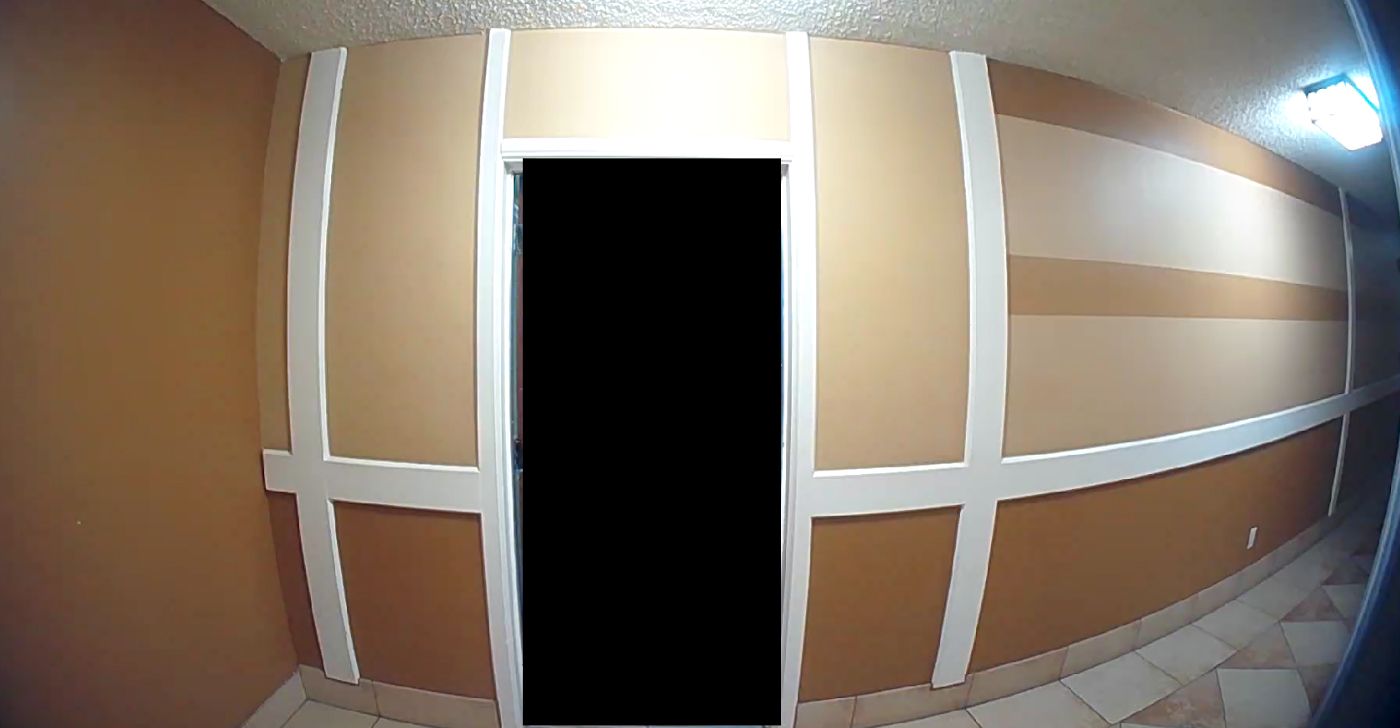 An example of Ring's privacy zone, showing a blacked out door frame excluded from the ring footage