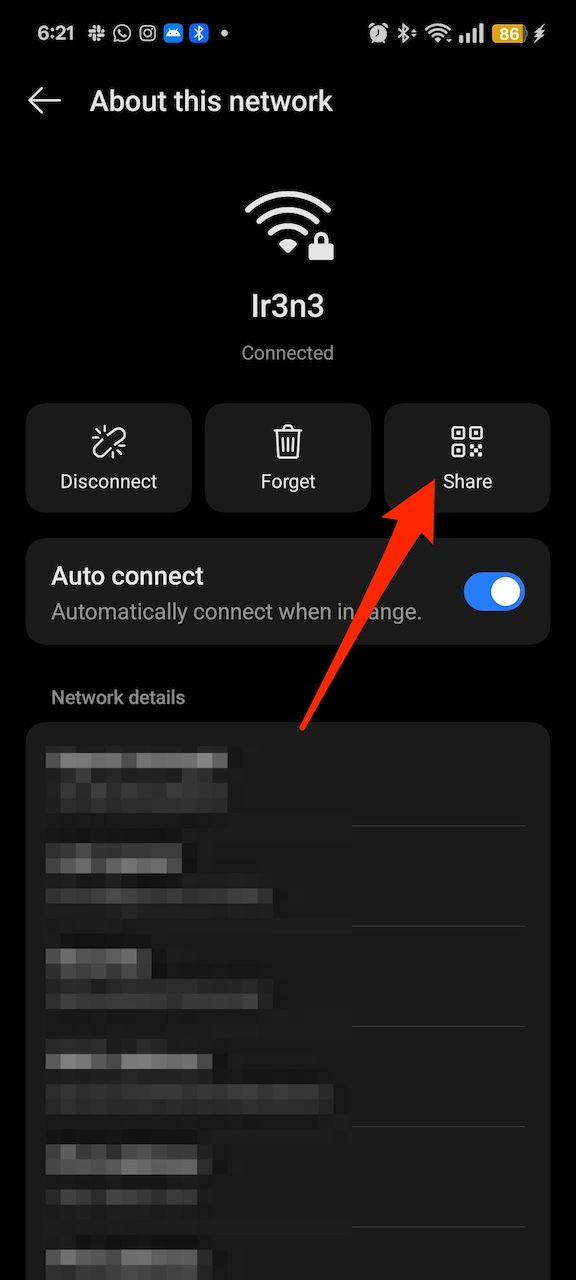 Red arrow pointing at Share option under Wi-Fi network's information menu