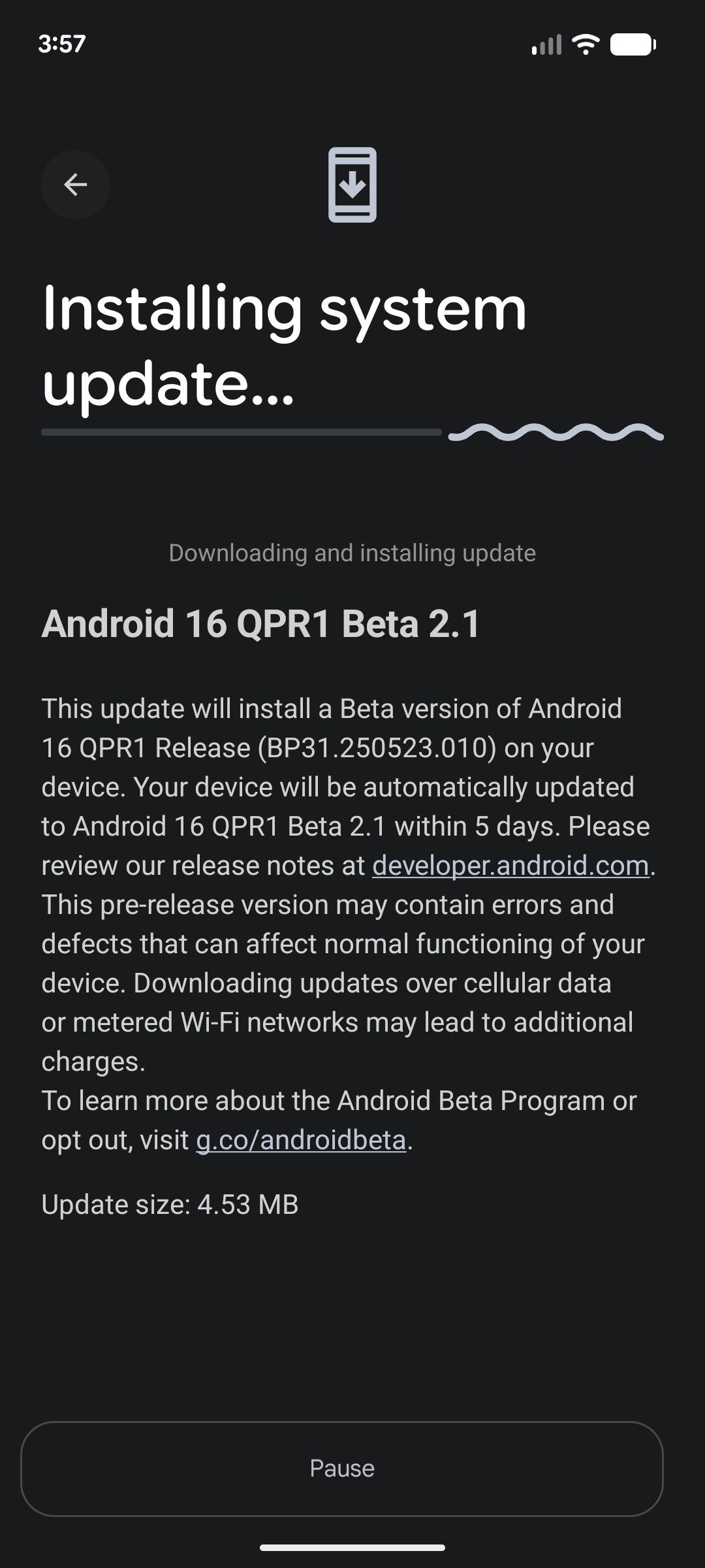Screenshot showing Android 16 QPR1 Beta 2.1 downloading on a Pixel 7.
