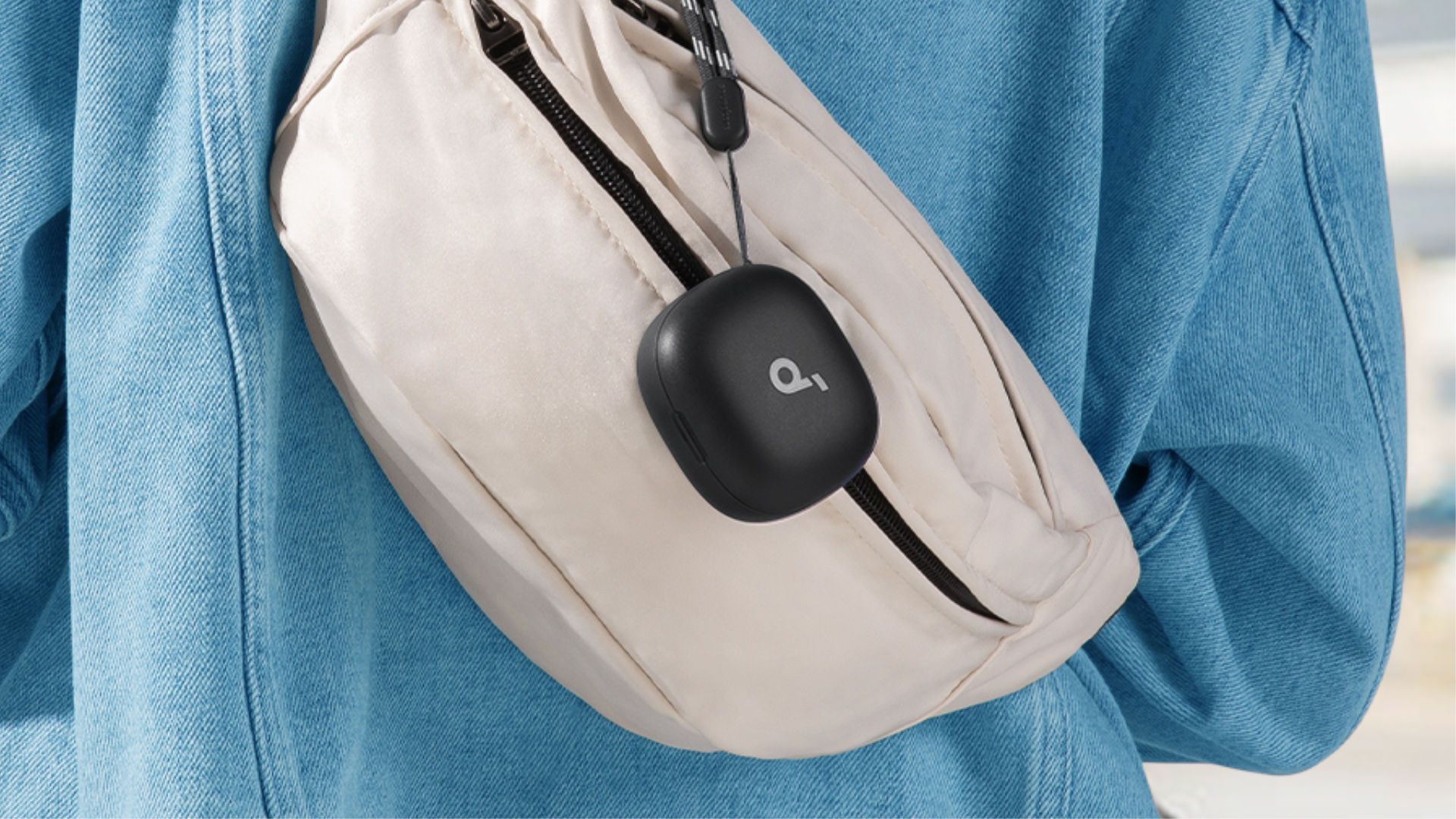 The Anker Soundcore P20 charging case attached to a travel bag.