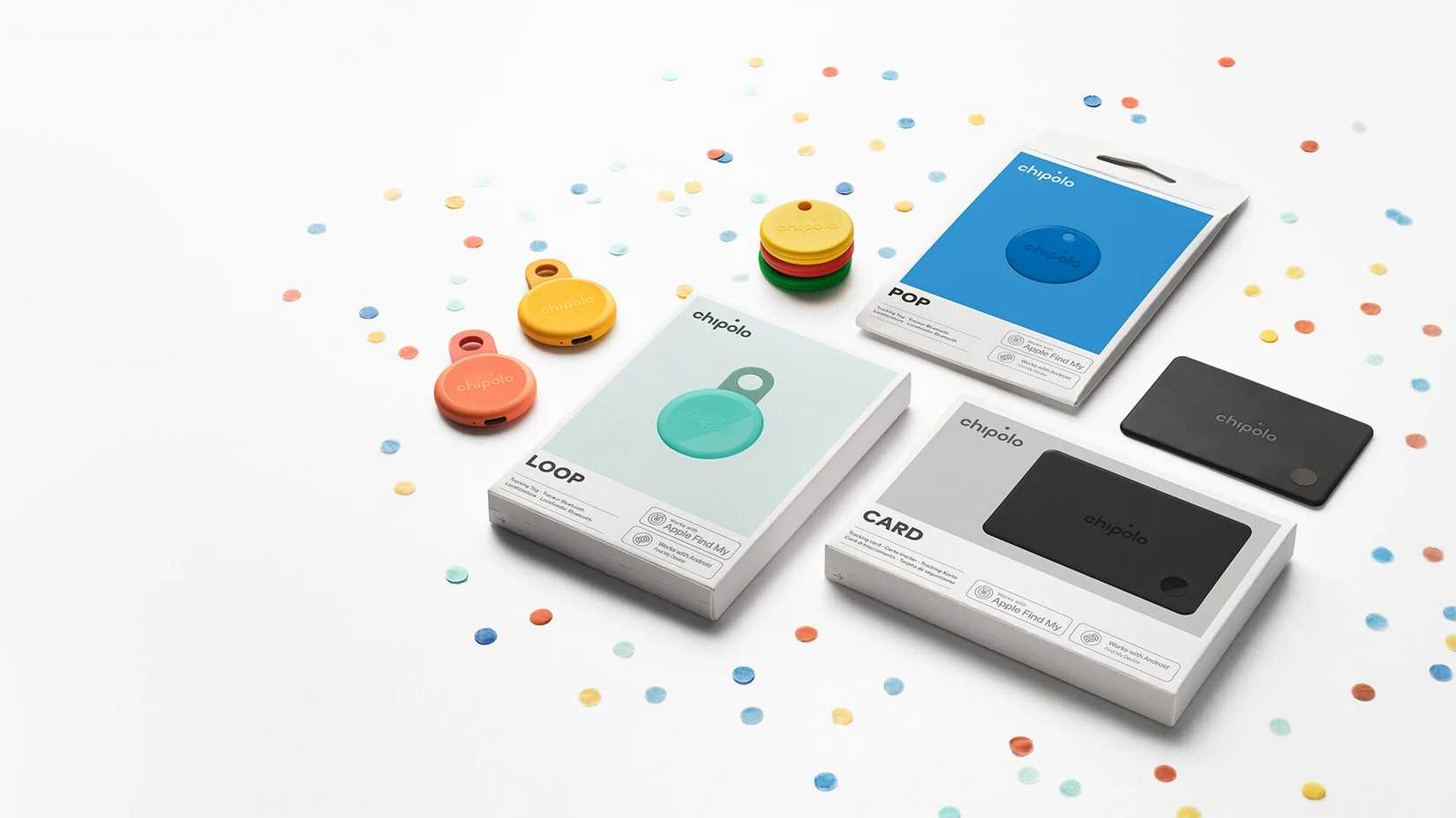 The Chipolo Loop and Card next to their packaging and some confetti.