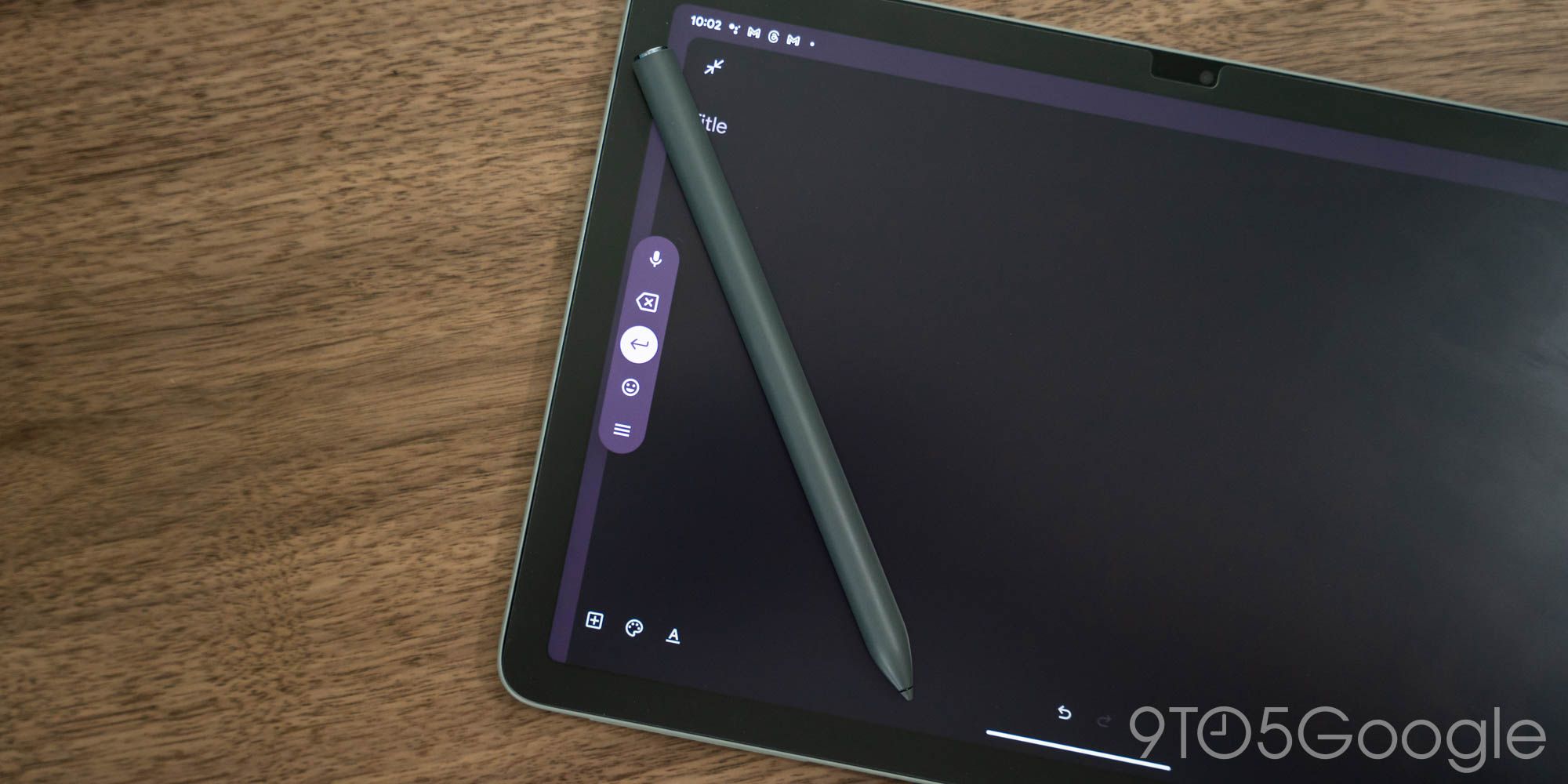 The unreleased Google Pixel Tablet Pen sitting on a Pixel Tablet.