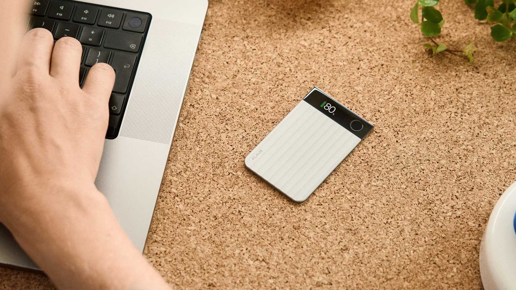 The Plaud Note Pro sitting on a desk.