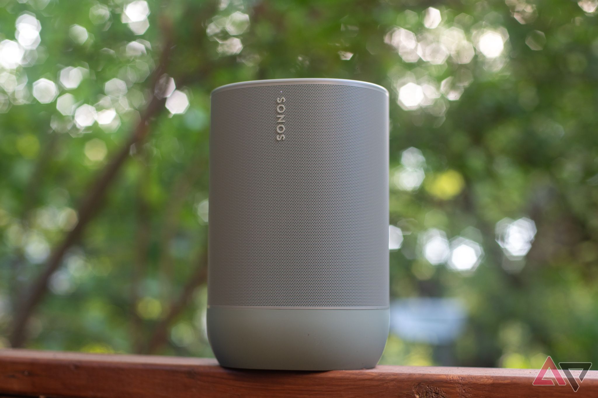 A Sonos Move 2 speaker outdoor with trees in the background