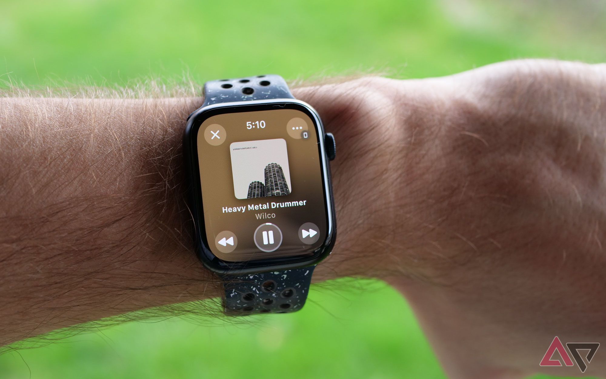 An Apple Watch Series 9 displaying a music player