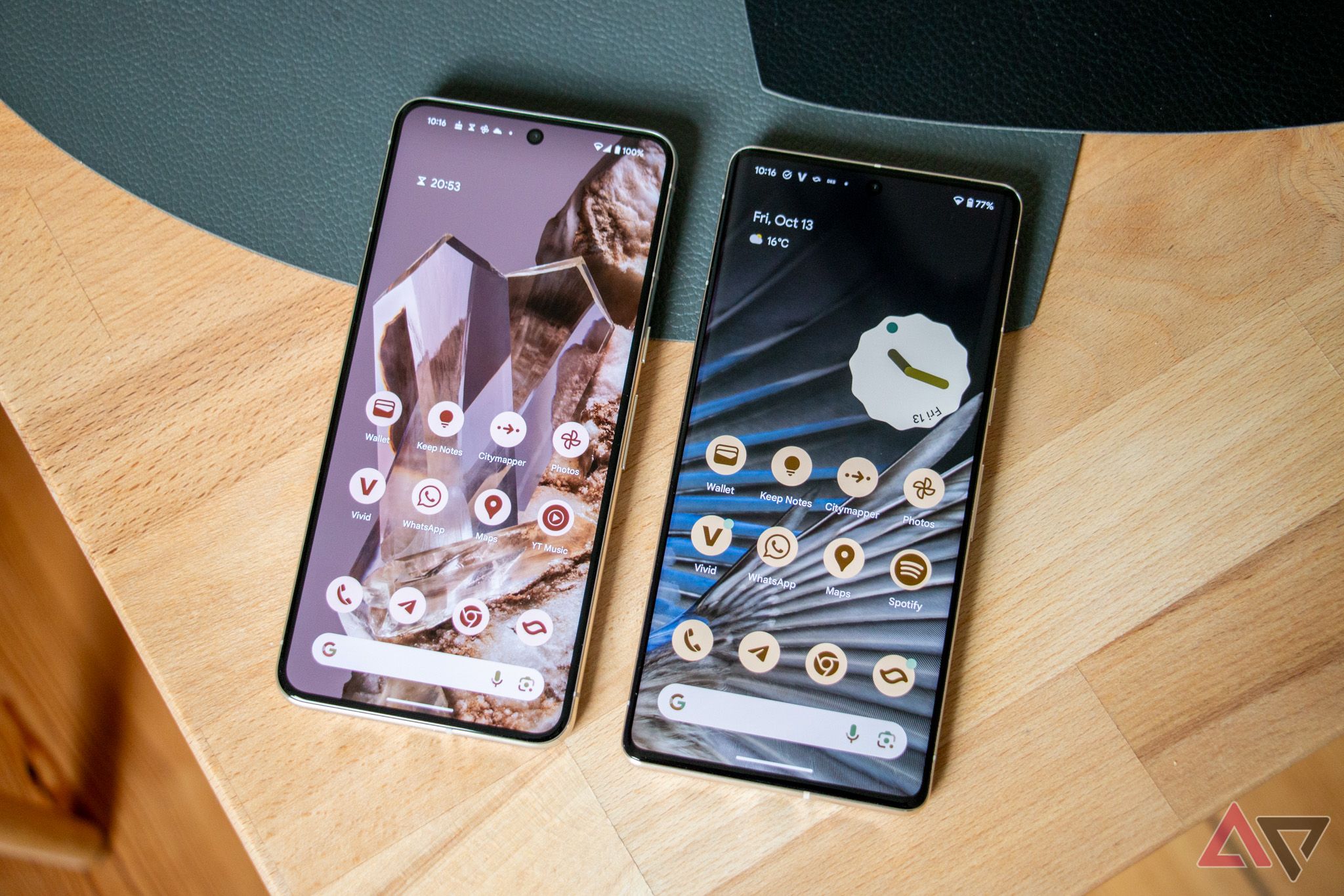 The Pixel 8 Pro next to a Pixel 7 Pro with both phones on their home screens.