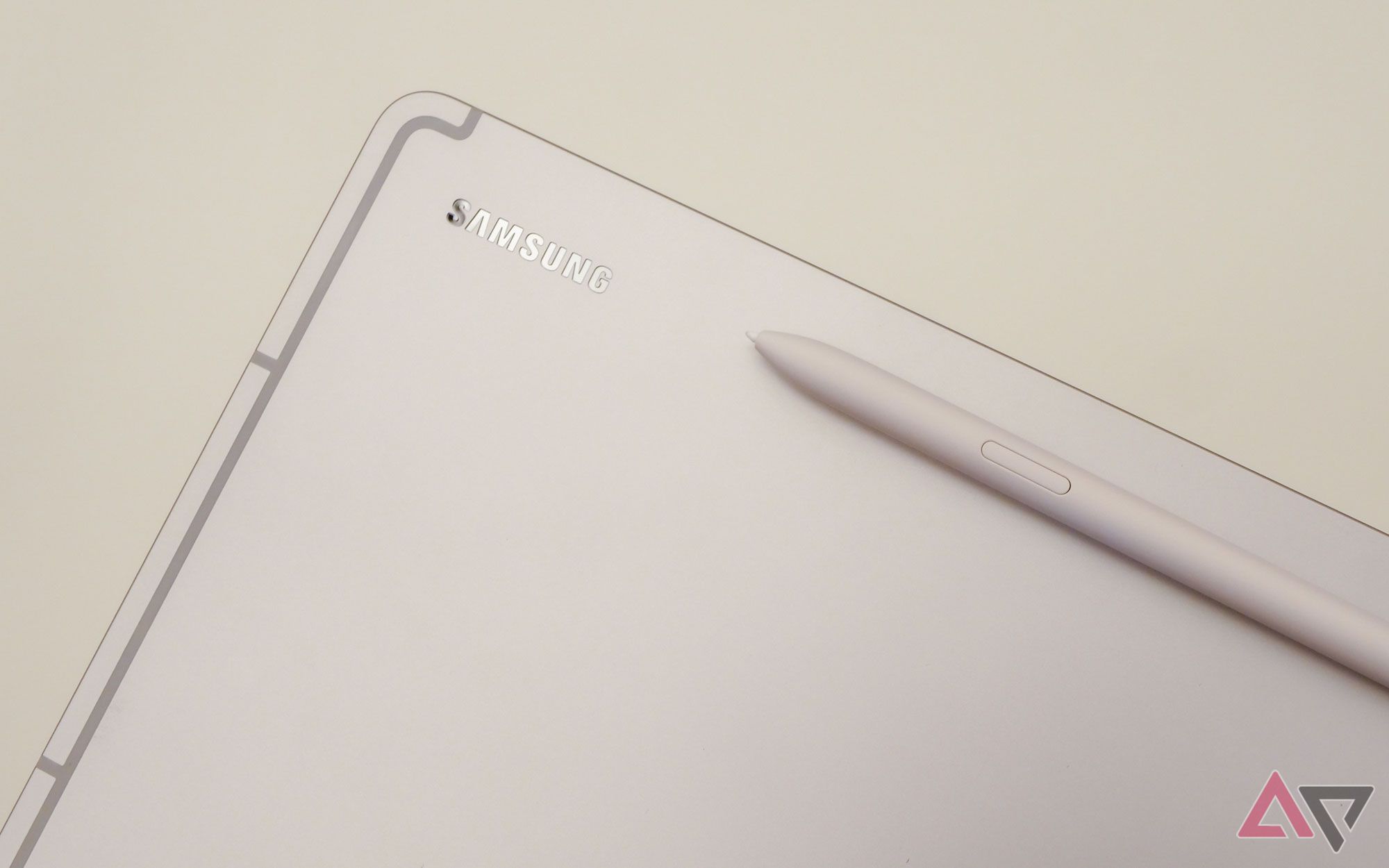 white samsung galaxy tablet showing s pen attached