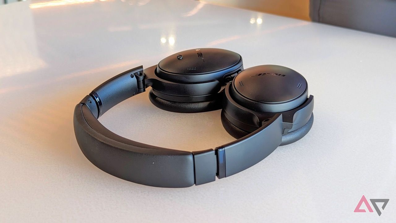 A pair of headphones sitting on a table.