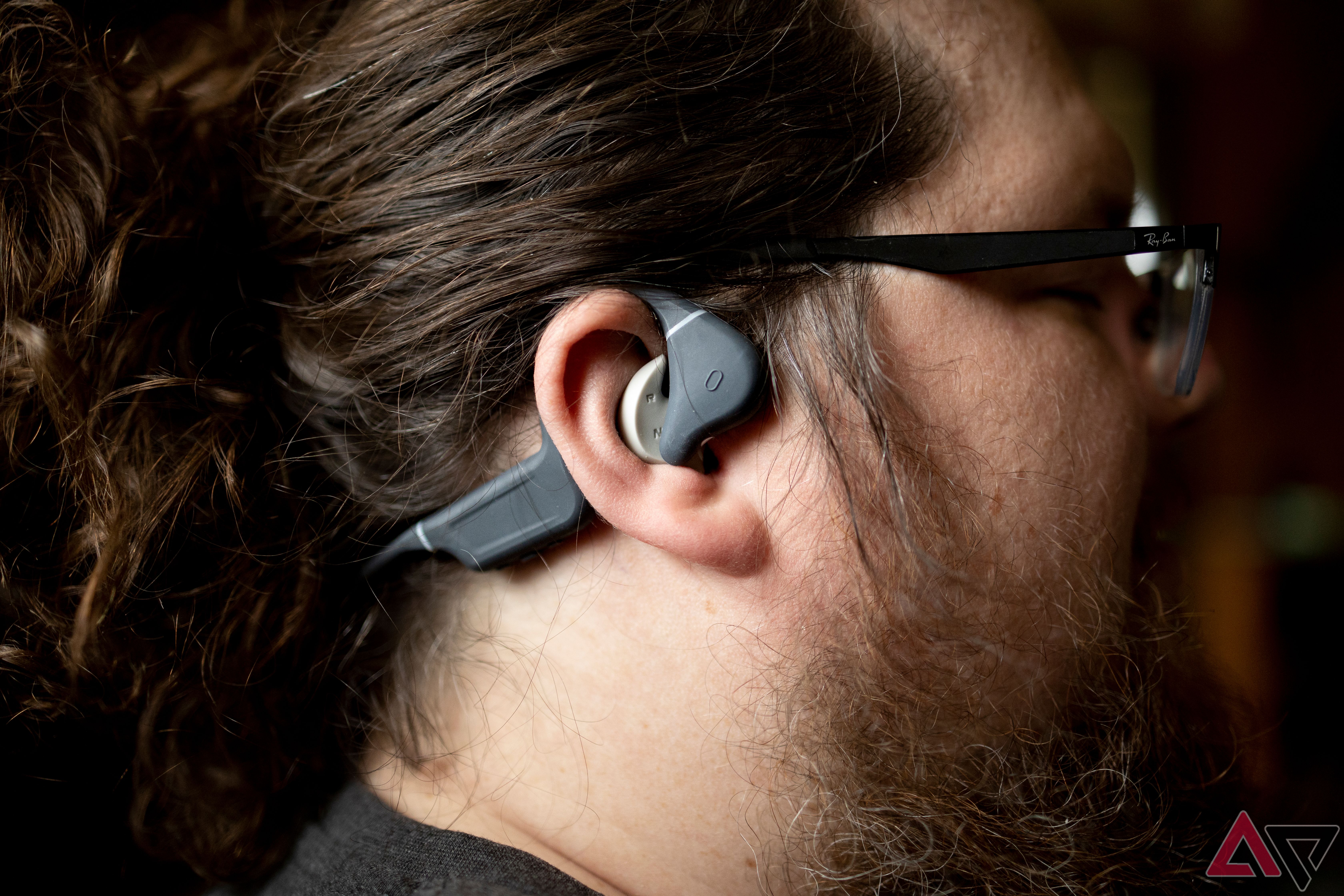Close up side profile of man wearing Naenka Runner Diver 2 headphones