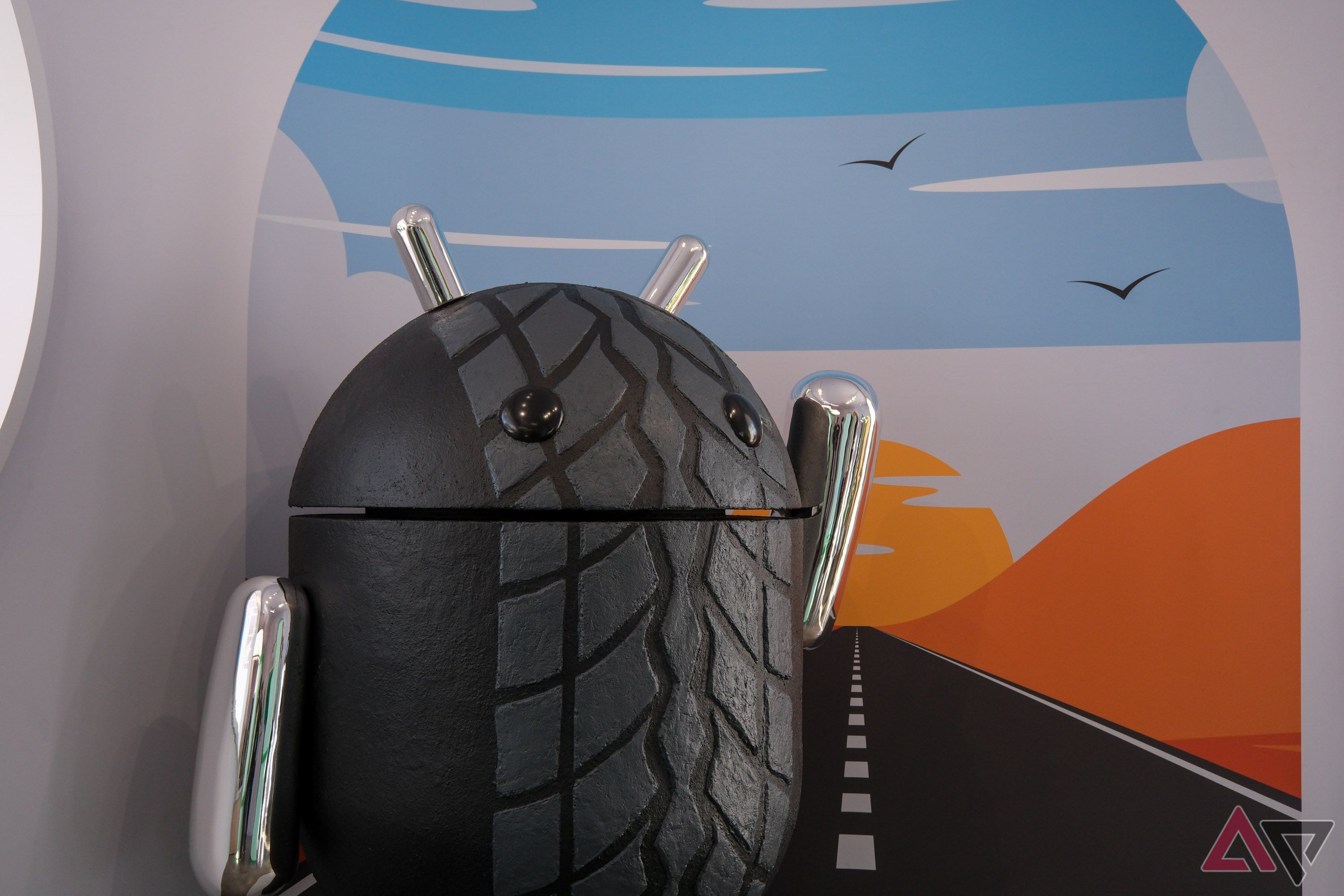 An Android mascot resembling a tire