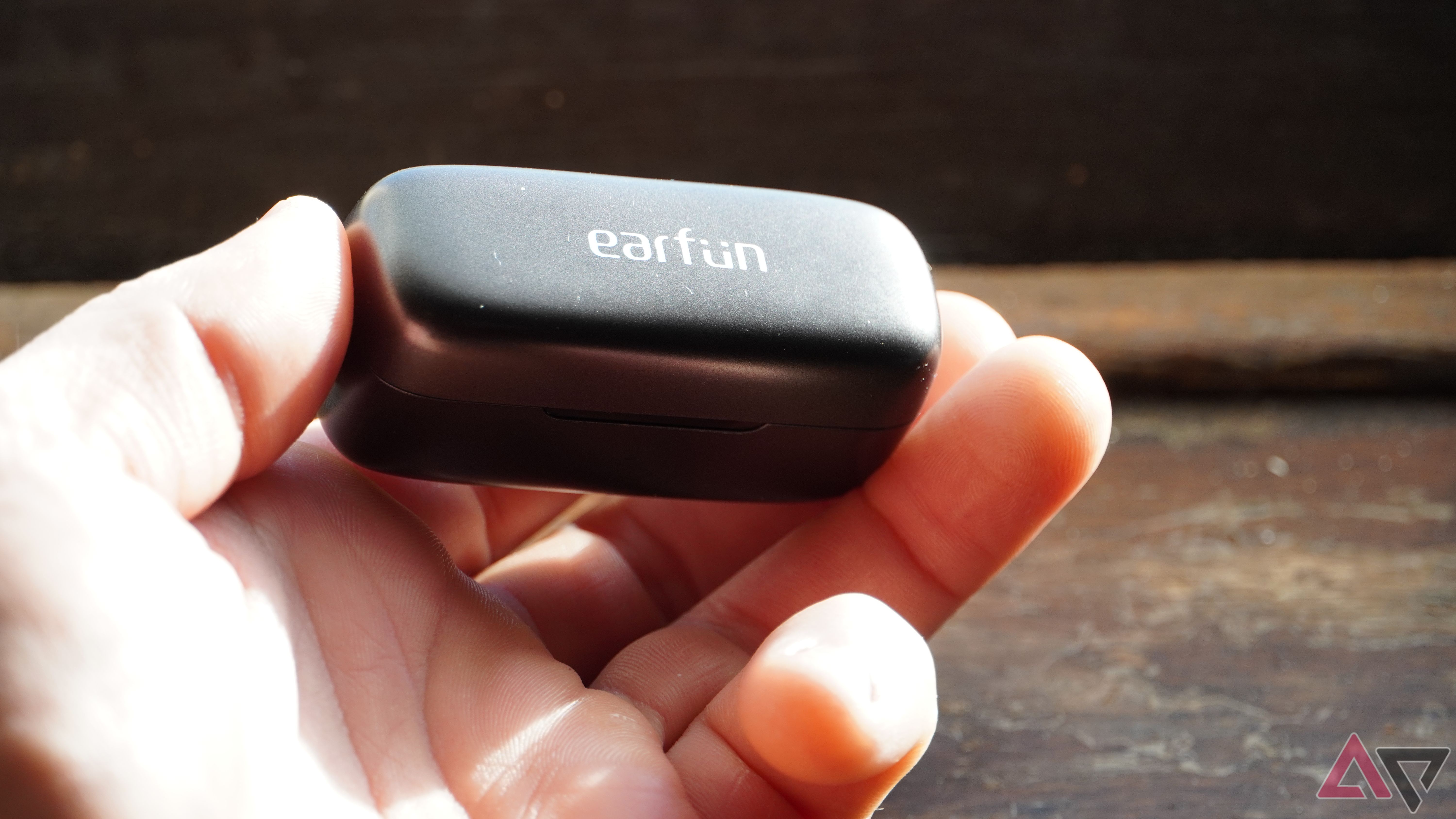 EarFun Free Pro 3 closed case held in a hand