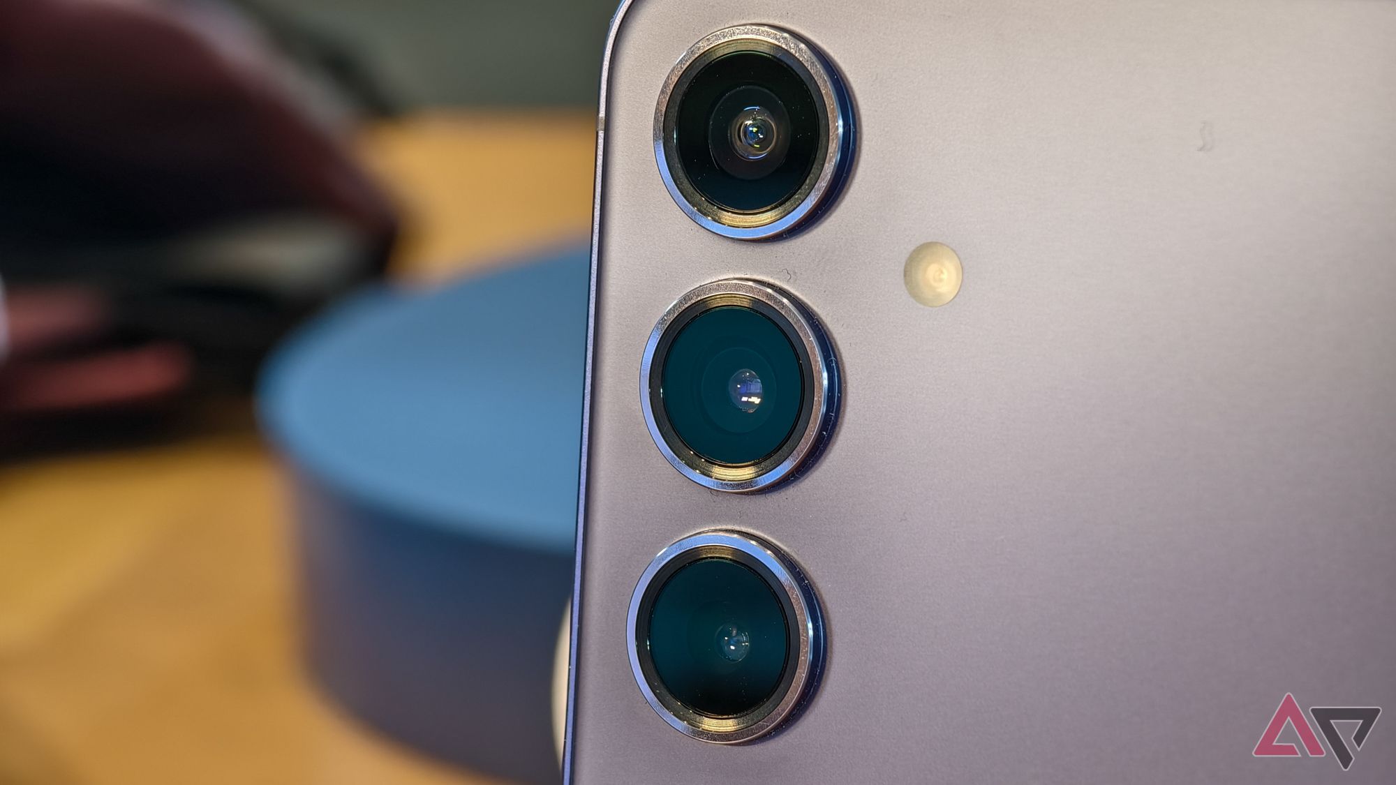 Samsung Galaxy S24+ purple finish, with a close-up on the rear cameras