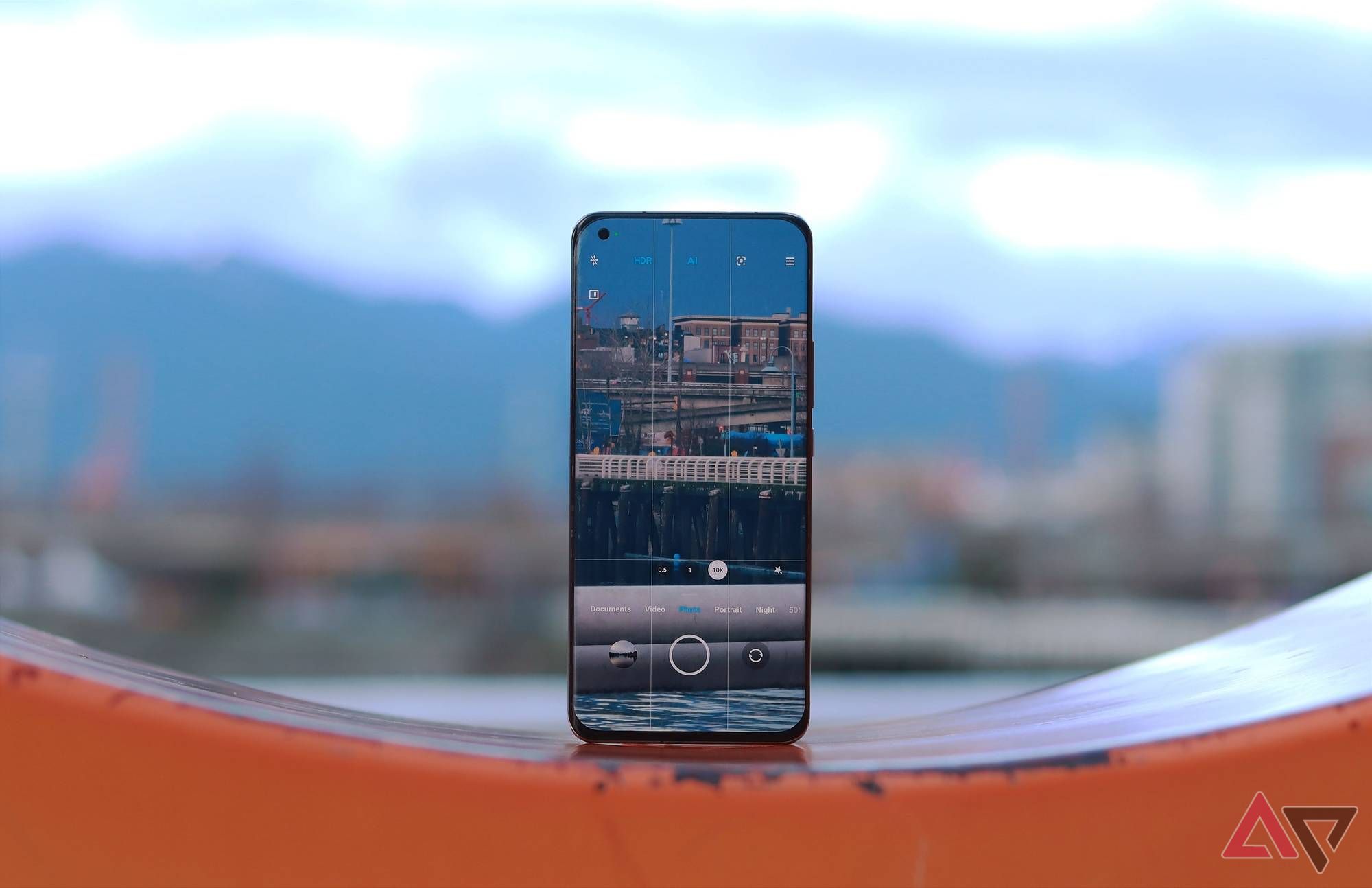 The Xiaomi Mi 11 Ultra with the camera viewfinder open overlooking a skyline.