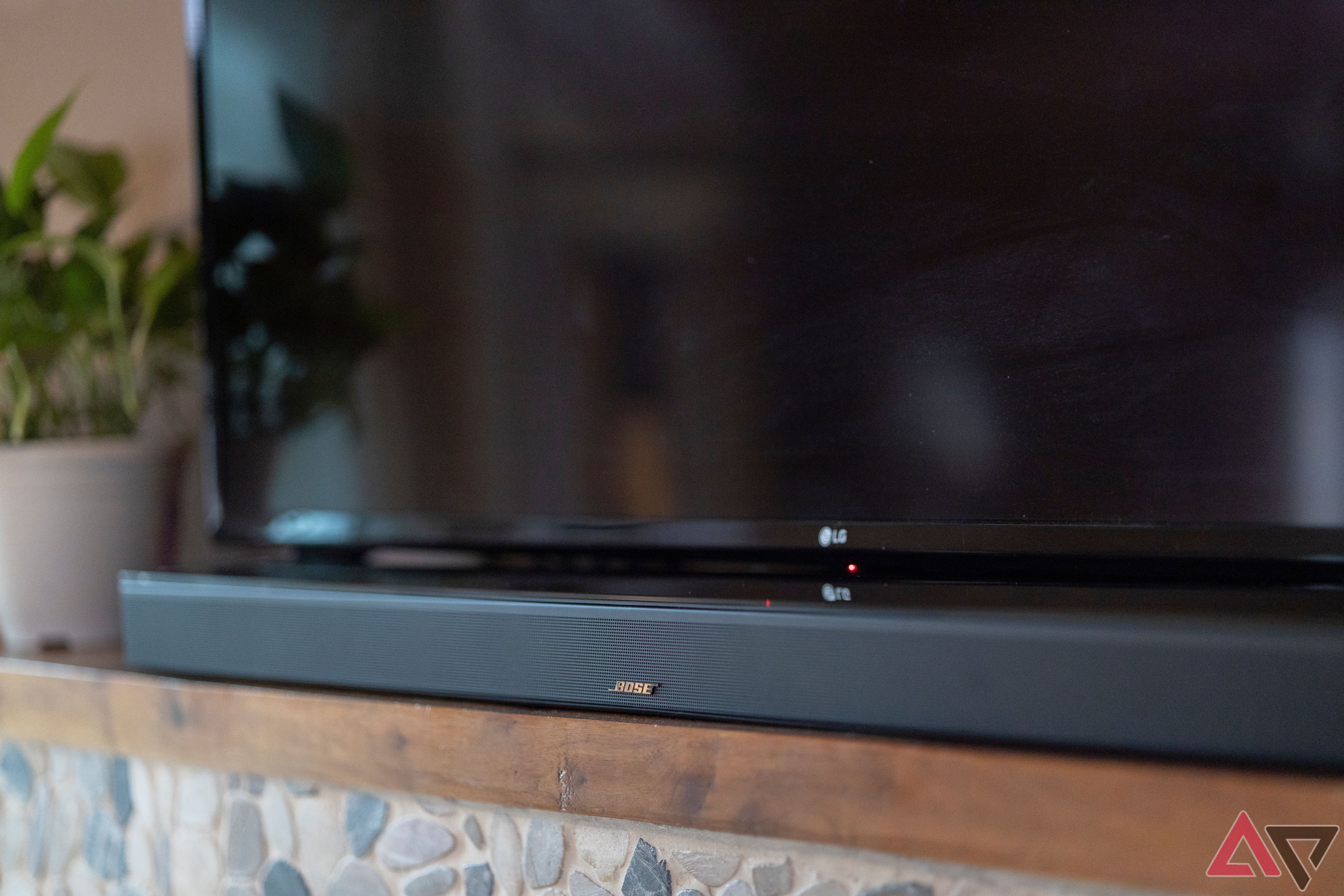 Close up of Bose Smart Ultra soundbar on mantle under TV