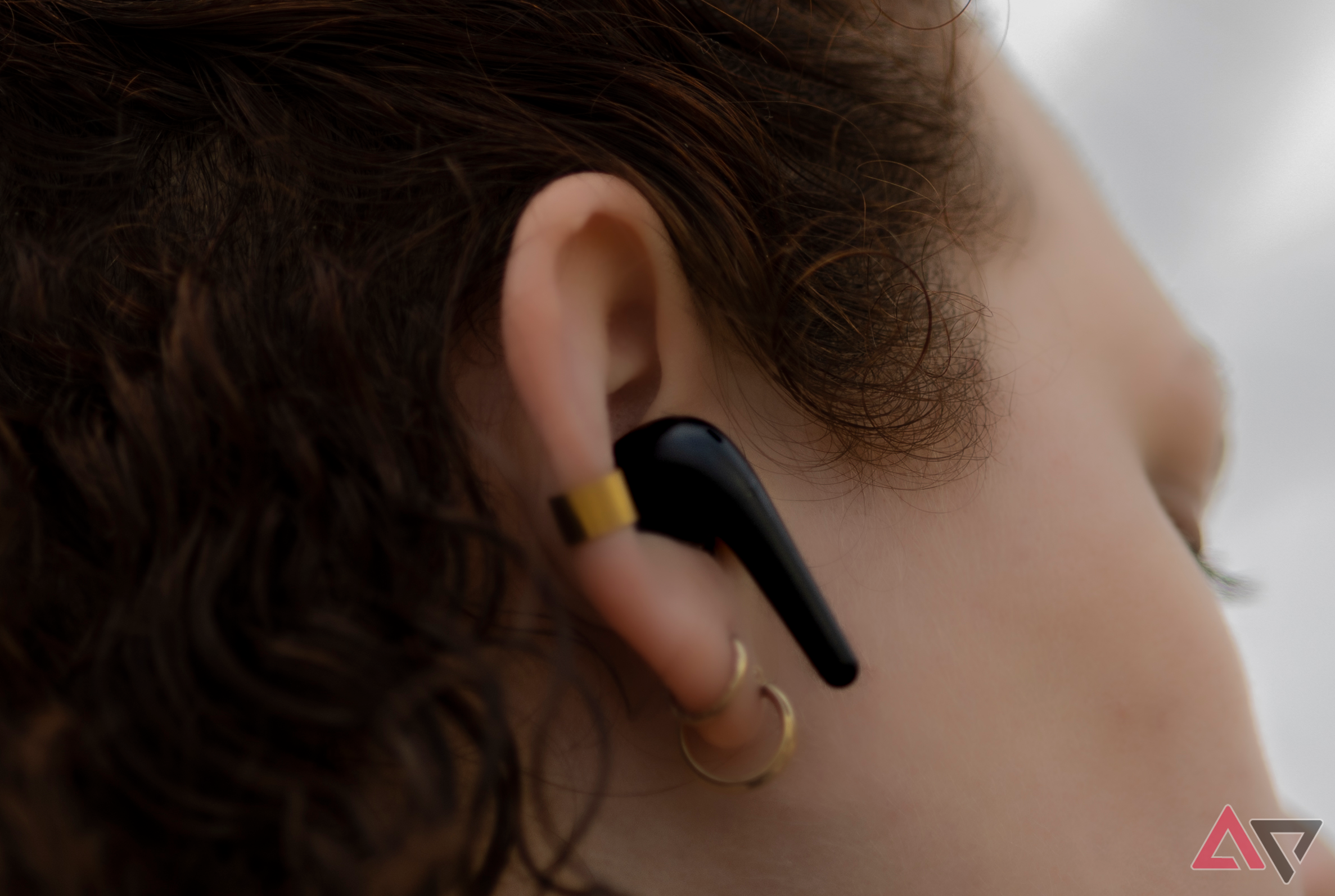 Close up angle of woman wearing 1More Aero True Wireless ANC Headphones