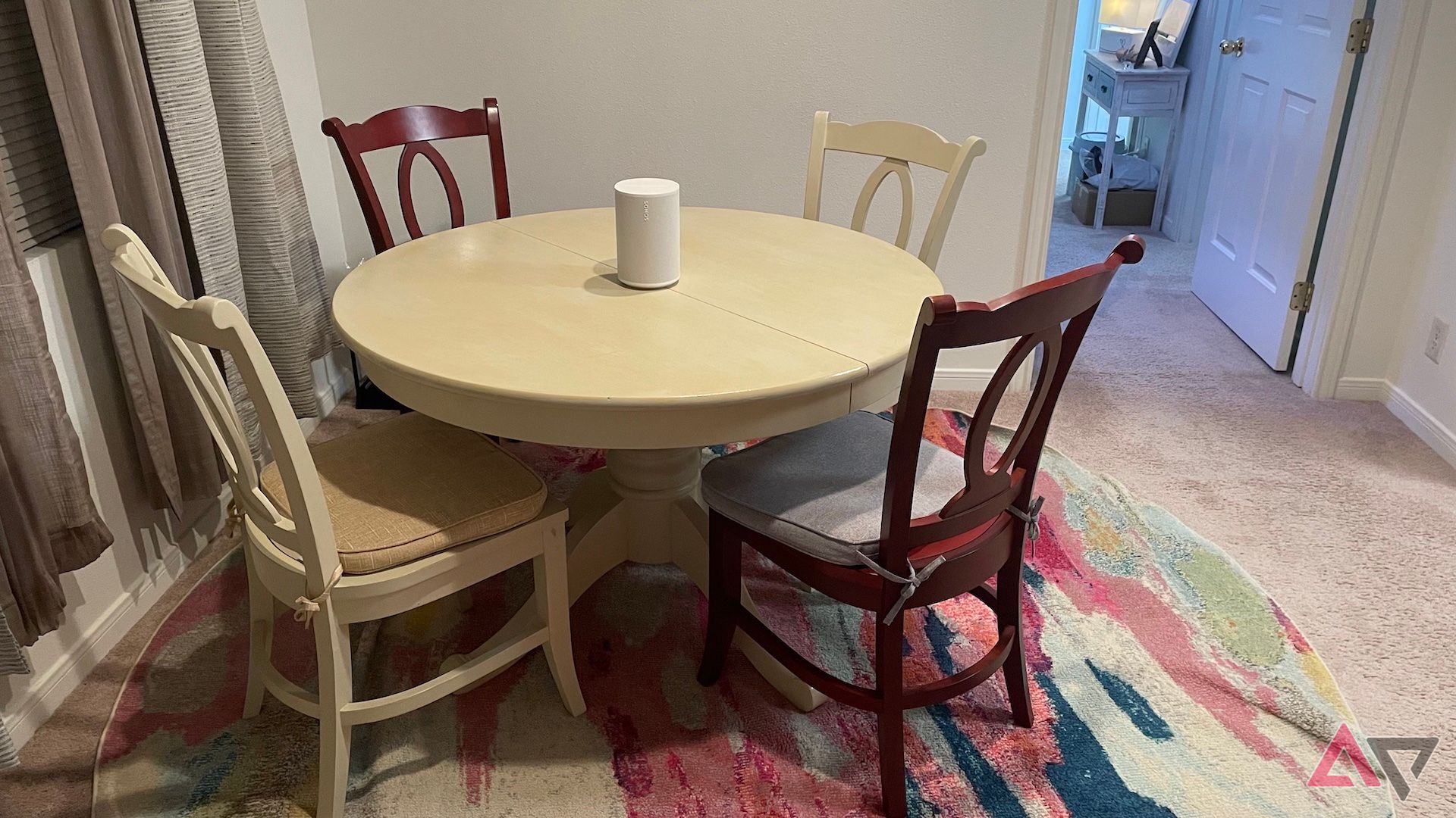 The Sonos Era 100 on a dining room table