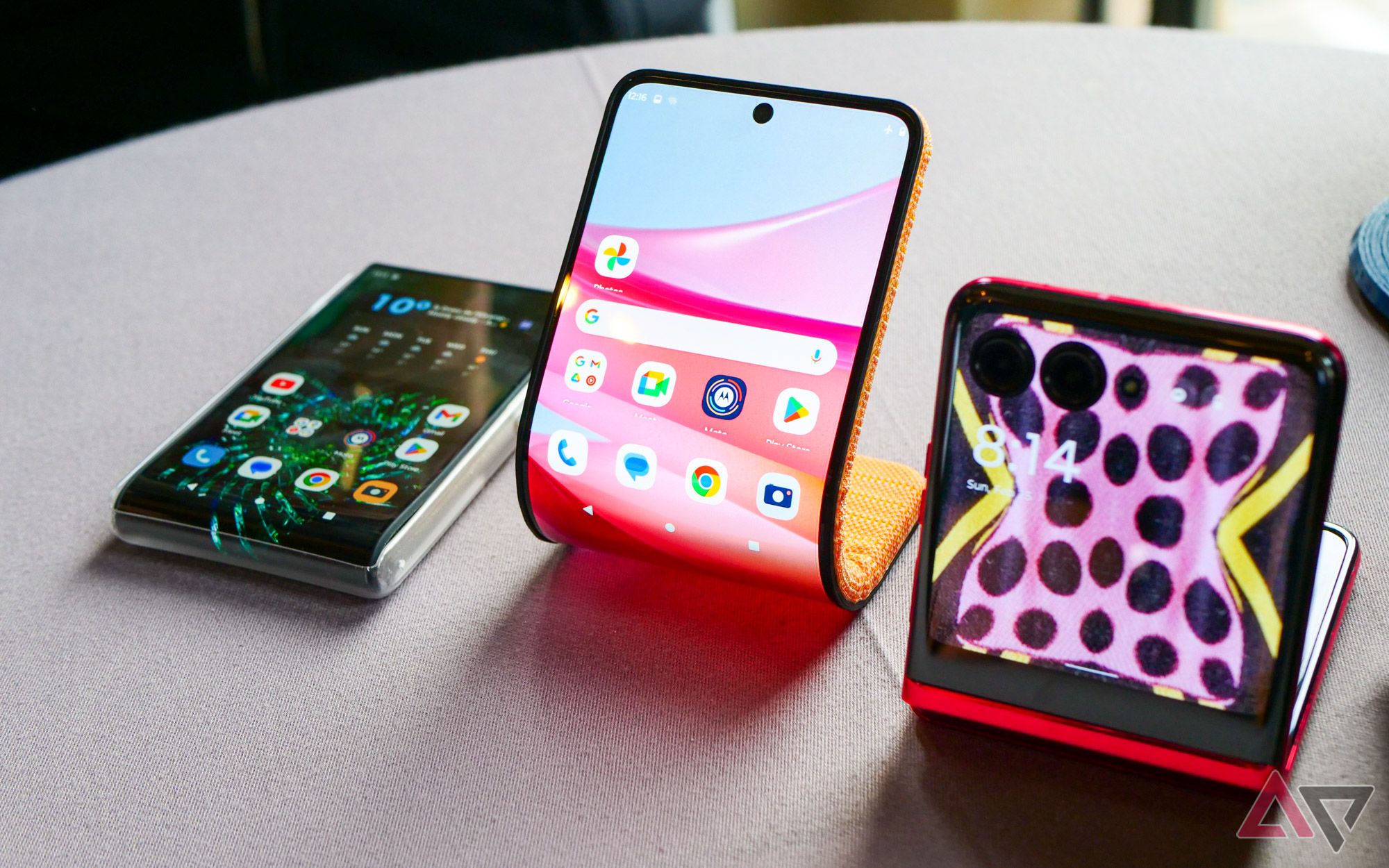 Motorola's bendable phone next to the Razr+ and the Rizr concept rollable