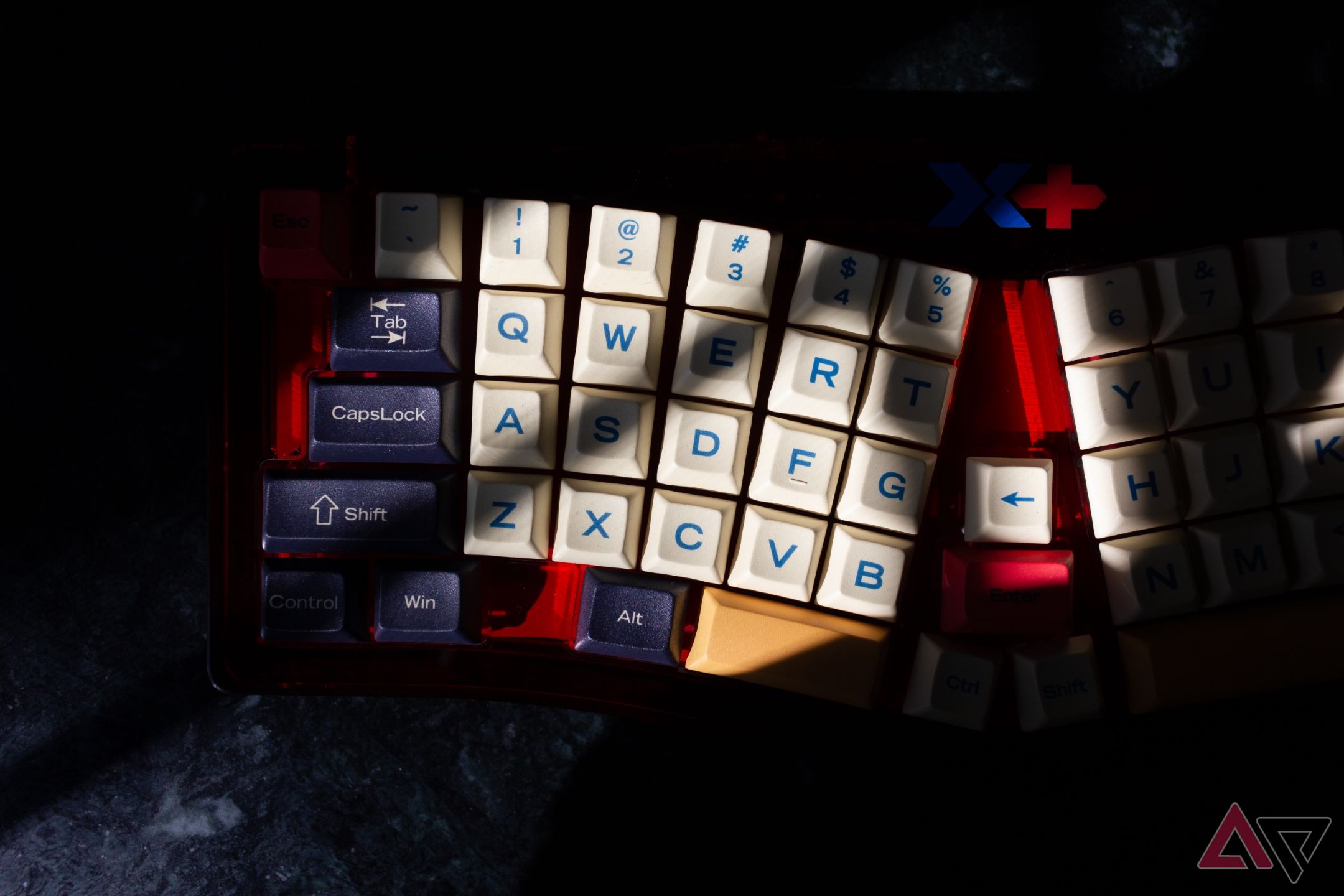 High-contrast photo of the VickyBoard showing off its keycaps on a sunlit tabletop