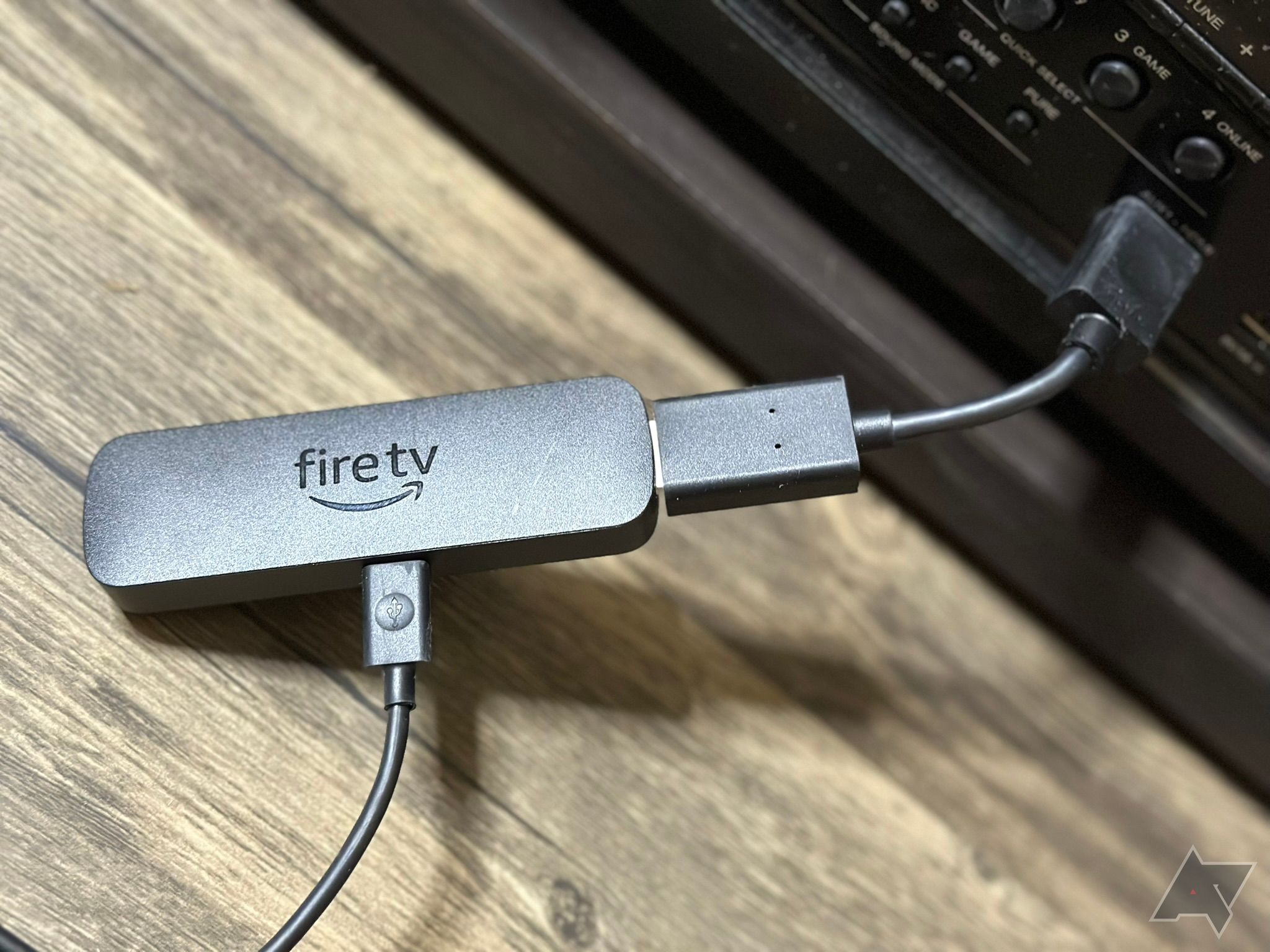 Amazon's Fire TV Stick 4K Max plugged into a receiver