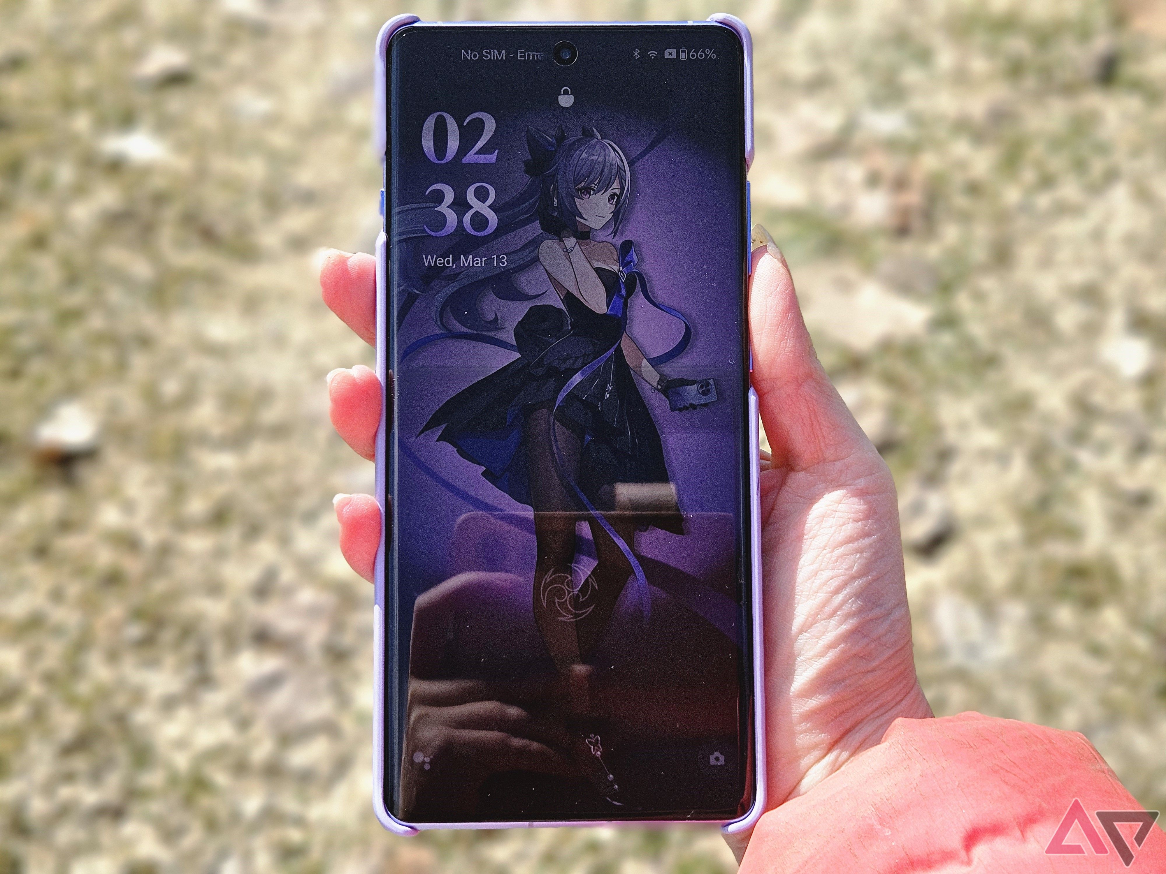 holding oneplus 12r genshin impact edition phone outside with keqing themed wallpaper display