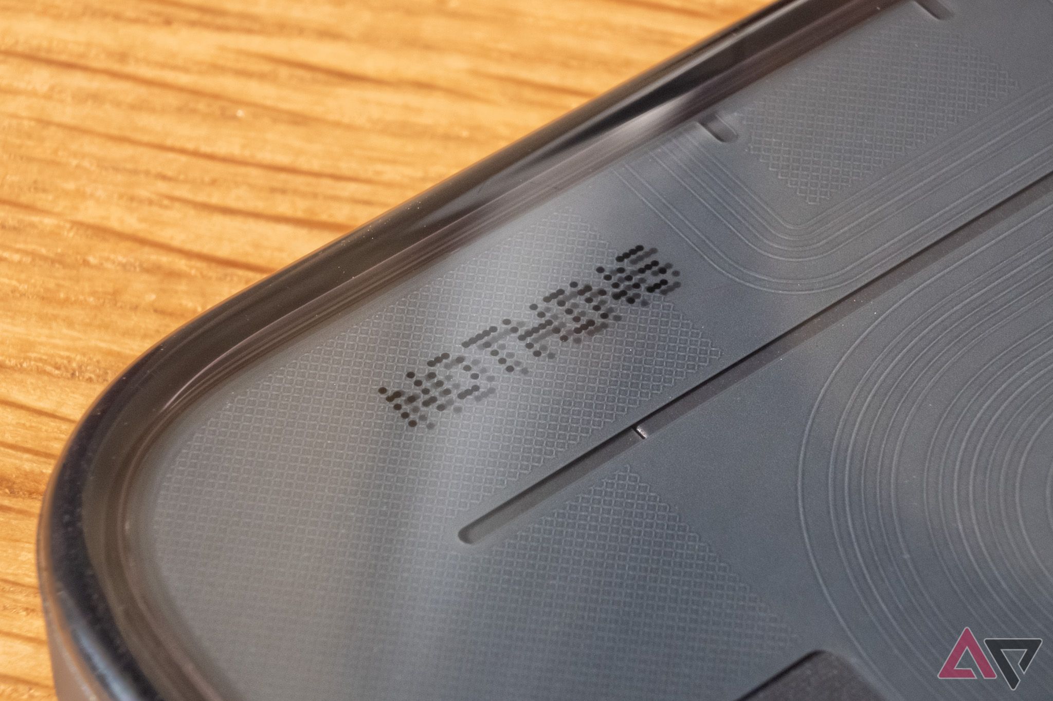 A close-up of Nothing's wordmark on the back of a phone